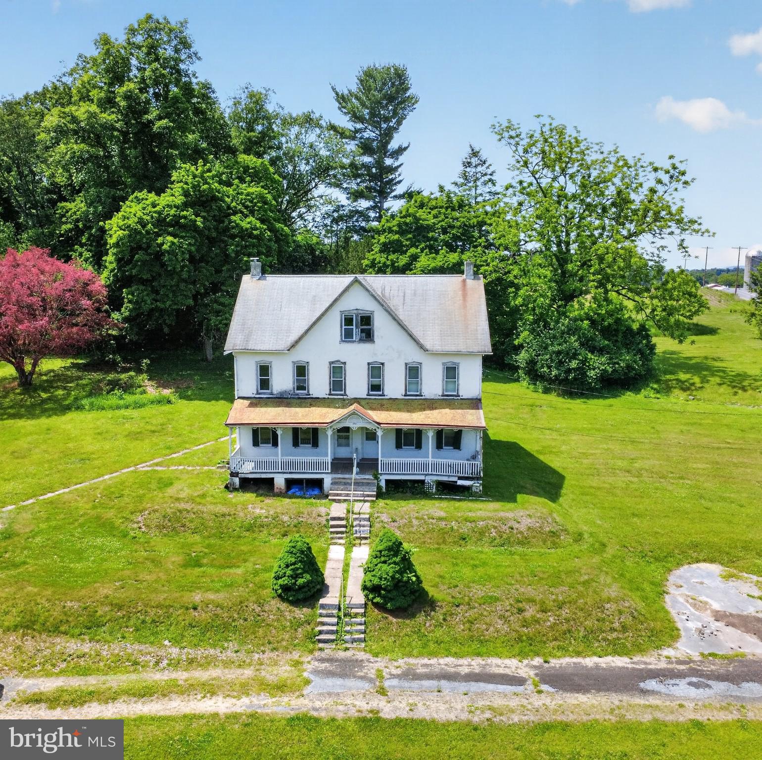 Exceptional opportunity to own 9.8 acres of mostly cleared, usable land in East Coventry Township, served by the highly regarded Owen J. Roberts School District. Stretching from Kolb Road to Baptist Church Road, this unique property offers tremendous potential for equestrians, investors, builders, and those seeking a private country estate. The existing improvements include a large duplex in need of significant renovation, making this primarily a land-value opportunity. Built in the 1890’s the bones of the duplex consist of 16-inch stone walls & each side features a living room, dining room, and kitchen on the main level, three bedrooms and a hall bath on the second floor, plus two additional bedrooms on the third floor. Both units also have full basements. The duplex could potentially be restored, maintained as an income-producing property, or converted into a single-family residence, subject to buyer's vision and any required approvals. A barn is also located on the property and is currently in need of dire repair. With nearly 10 cleared acres, the land is ideally suited for horses and could be transformed into a horse farm, equestrian property, hobby farm, or private estate. According to discussions with East Coventry Township, the property may have subdivision potential, subject to township review and approvals. Buyers may wish to explore the possibility of creating additional building lots and constructing new homes while retaining the existing residence, offering exciting development and investment possibilities. The property's unique layout, extending from Kolb Road to Baptist Church Road, may provide additional flexibility for future planning and use. Whether you're looking for a special equestrian property, a renovation project with acreage, a private estate setting, or a property with potential development opportunities, this offering presents a rare chance to acquire nearly 10 acres in a desirable Chester County location. Seller had a survey done and is available online. Through Seller’s research, the property is subdividable with up to 4 lots…upon plot plan approvals. Buyer is responsible for conducting their own due diligence regarding subdivision, zoning, permitted uses, development potential, and all township requirements.