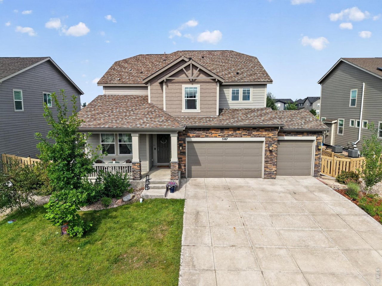 A premium mountain-view and greenbelt-backed setting meets over 4,000 finished square feet of thoughtfully designed living space in this beautifully maintained Timnath Ranch home. With five bedrooms, 3.5 baths and a 4-car tandem garage, this home is designed for the way modern families want to live.Step inside and the scale is immediately apparent. The great room features soaring ceilings and expansive windows that bring in abundant natural light. The open main level flows naturally from the living room into a spacious kitchen with an oversized granite island, generous cabinetry, stainless-steel appliances and plenty of workspace-equally suited to everyday family life or entertaining a crowd. A separate formal dining room gives larger gatherings their own space. A private office with French doors adds a dedicated work-from-home space.Upstairs, four spacious bedrooms provide room for family and guests, including a generous primary suite with mountain views, walk-in closet, and private en suite bath. Fully finished and permitted in 2022, the basement area creates an entire additional lifestyle zone with dedicated areas for recreation, relaxation, kids' activities, fitness, and entertaining, plus a full bathroom. At the center of the lower level is a newly added bar, creating a true destination for entertaining without leaving home.Outside, a 2025 Trex deck extends the living space into the backyard with multiple areas for gathering. The landscaped yard opens directly toward the greenbelt with a premium mountain-view delivering year-round sunsets.The 4-car garage includes a tandem fourth bay, providing valuable room for all of the gear that comes with Colorado living.Residents enjoy access to two community pools, while nearby Timnath Community Park offers tennis, pickleball, basketball, playgrounds, and open recreation space. The location also provides convenient access to Horsetooth Reservoir and Lory State Park for year-round outdoor recreation.