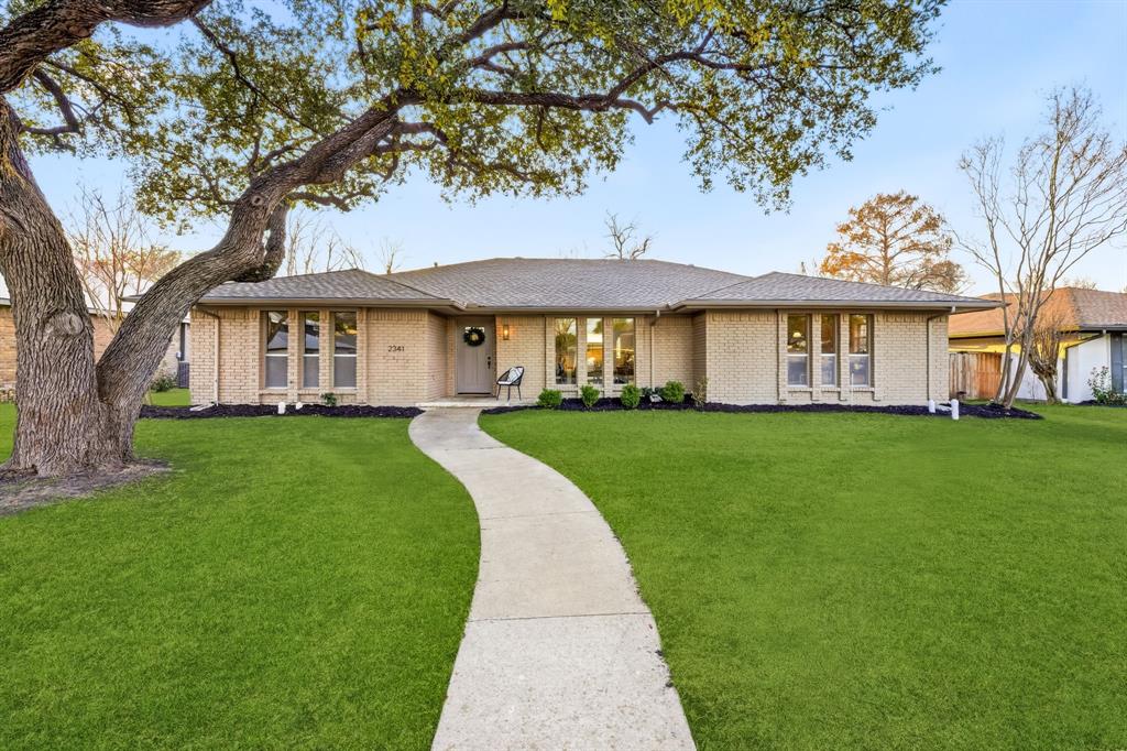 Welcome to 2341 Monticello Cir, a beautifully renovated gem in a highly sought-after area of Plano! This traditional-style home exudes charm and elegance positioned perfectly at the end of a serene circle street. As you enter, you'll be captivated by the unique curved fireplace, a striking focal point that sets the tone for the home's inviting ambiance. The spacious dining and living areas are gracefully separated by classic brick arches, creating a seamless flow that's perfect for entertaining or simply relaxing. Kitchen is a culinary dream, featuring a large island with butcher block countertops, updated cabinets with quartz countertops, and stylish tile backsplash, with ample storage and modern amenities. The flexible floor plan accommodates a variety of lifestyles. The primary suite is a luxurious retreat, complete with a soaking tub, walk-in shower, double vanity, and a spacious walk-in closet. This home has been renovated to the nines, ensuring modern comforts and timeless style.