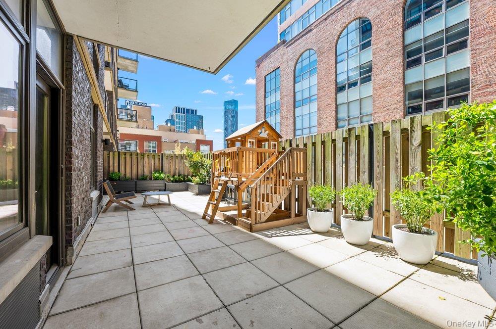 Rare 3 Bed / 2 Bath with Expansive 1,391 SF Interior & 571 SF Private Terrace at The YardThis rarely available 3-bedroom, 2-bathroom residence in prime Hunters Point offers approximately 1,391 square feet of interior space and an exceptional 571 square foot private terrace—delivering one of the most compelling indoor-outdoor layouts in a full three-bedroom Long Island City condo.The well-designed bedroom layout provides excellent separation of space, while the open living and dining area features newly updated flooring and flows directly to the terrace from both the living room and primary suite. Oversized windows bring in abundant natural light and enhance the home’s airy, open feel.A true standout is the expansive private terrace, offering generous space for dining, lounging, and entertaining—an uncommon outdoor footprint for a Hunters Point condo of this size.All three bedrooms are exceptionally well-proportioned, highlighted by a massive primary suite large enough to accommodate a sleeping area, lounge space, and home office setup, along with direct terrace access and a custom walk-in closet.Storage is a defining feature of the home, with seven custom closets throughout—most outfitted with Elfa shelving systems, offering highly efficient, flexible, and buyer-customizable organization.The kitchen is outfitted with high-end finishes including lacquered cabinetry, Caesarstone countertops and backsplash, a Viking 6-burner range, Wolf hood, Miele dishwasher, and LG smart, large-capacity washer/dryer discreetly located within a custom closet in the bathroom, along with a reverse osmosis water filtration system.Both bathrooms feature premium finishes including Hansgrohe fixtures, travertine tile, glass accents, and custom walnut cabinetry. The primary bath includes a soaking tub, rainfall shower, and double vanity.Residents enjoy full-service amenities including a roof deck with BBQ grills and skyline views, a resident lounge, fitness center, an attended lobby, and a secure Swiftlane smart access system.Located moments from Gantry Plaza State Park, the East River Ferry, and the 7 train, offering easy access to Manhattan and the best of Hunters Point waterfront living.