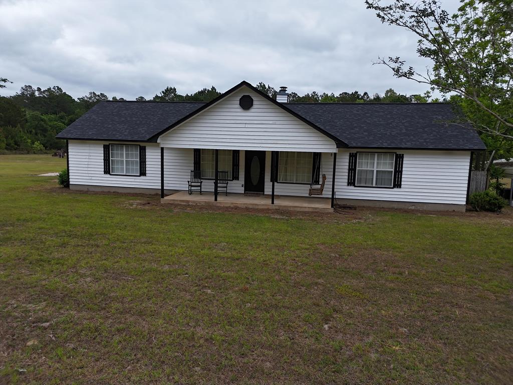 Escape to the peace and quiet of country living with this charming 3 bedroom, 2 bath home nestled on 8 beautiful acres. Offering 1,575 square feet of comfortable living space, this property provides the perfect blend of privacy and practicality. The home features a welcoming layout with plenty of room to relax and unwind, while outside you'll find endless possibilities. A spacious 50 x 40 wired shop is ideal for hobbies, storage, or a home-based business. There's ample space for a garden, animals, or simply enjoying the open land and fresh air. A wet-weather pond sits in the front yard, adding to the property's natural charm (currently dry due to drought conditions). Located on a quiet dirt road, this property offers a peaceful, tucked-away setting while still being within reach of nearby conveniences. 2.6 acres in the very back of property  is in a conservation easement. If you're looking for room to grow and a slower pace of life, this property is a must-see! Click here for virtual tour: https://my.matterport.com/show/?m=ZJhJy83bKF4&mls=1