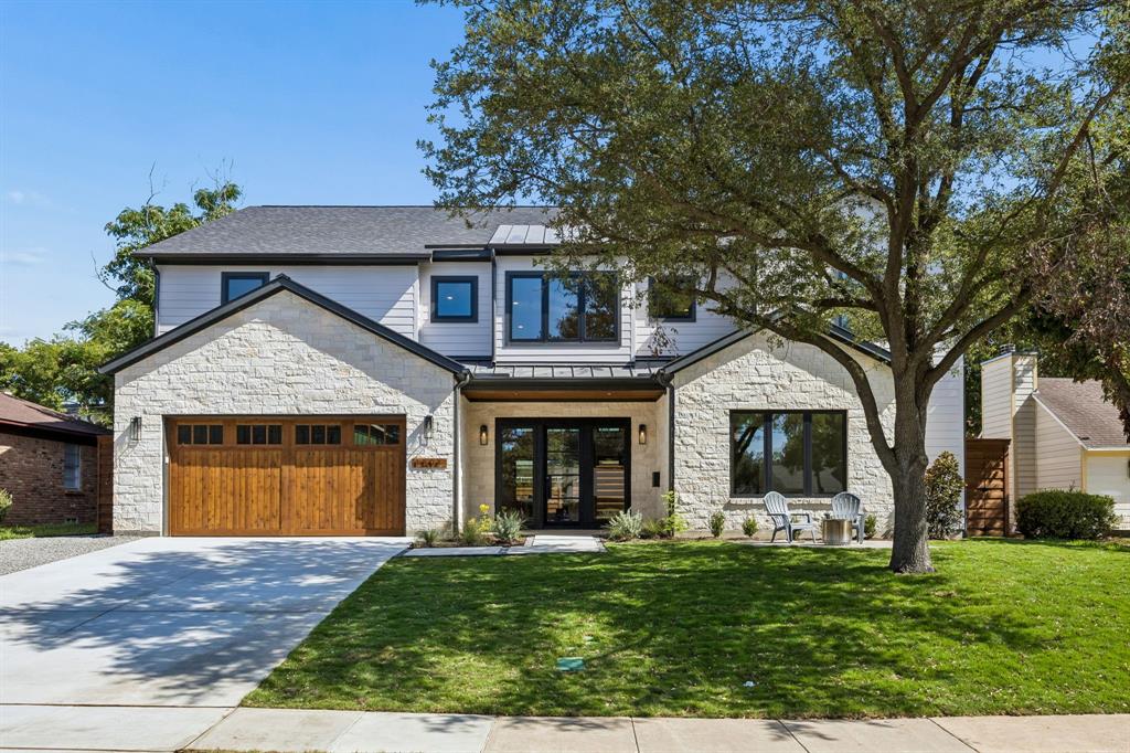 Stunning new construction in The Reservation, just completed by a local team that understands how today’s buyers want to live. This home blends thoughtful design, high-end finishes, and everyday functionality in one of the area’s most desirable neighborhoods. The main level features wood flooring throughout, excluding baths, with a layout designed for entertaining and daily living. The kitchen is equipped with GE Monogram appliances, including a 48in Pro Dual Fuel Range, 25-cubic-foot refrigerator, dishwasher, and drawer microwave. A massive 10x6 island with waterfall edges, discreet built-in charging stations, and seating for four anchors the space. A separate prep kitchen includes a second dishwasher and supports the main kitchen and entertaining areas. A walk-in pantry, dedicated Costco bulk closet, mudroom, and butler’s pantry provide exceptional storage and functionality. Designer-curated lighting, hardware, tile, and finish selections give the home a cohesive, custom feel throughout. All five bedrooms feature en-suite baths, providing privacy for family and guests. Upstairs, three secondary bedrooms are supported by a full-size utility room, while the primary suite includes a second washer-dryer connection within the closet. A dedicated office connects directly to the primary closet, adding convenience and flexibility. Additional highlights include two full guest baths, one downstairs positioned to serve as a future pool bath and another upstairs off the game room. The low-maintenance backyard features artificial turf and a built-in putting green. A spacious composite deck is topped by a cantilevered roof and includes two ceiling fans, lighting, and prewiring for a TV and speakers. The home is also extensively wired for today’s connected lifestyle. A rare opportunity to own newly completed construction in The Reservation with exceptional space, thoughtful functionality, and the elevated finish buyers expect at this level.