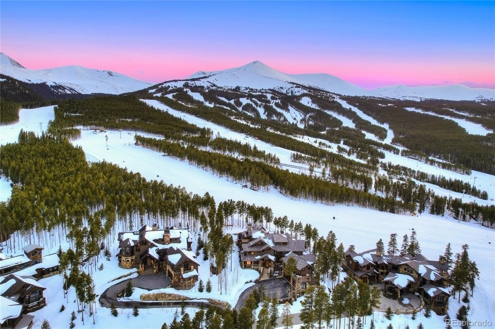 The BEST Ski-In, Ski-Out Home in ALL of Breckenridge—and One of the TOP True Ski Homes in Colorado! This is your chance to own one of ONLY 5 REAL slope-side, ski-in, ski-out homes with direct access to the main ski slope leading straight to the base of Peak 8. 422 Timber Trail backs RIGHT onto Trygve’s run, offering the absolute closest, most convenient ski access of any single-family home in Breckenridge. Imagine stepping out your back door and skiing straight to the lift—no shuttles, no walking, just pure mountain convenience.This is the FRONT ROW beach property of the mountains—you simply cannot get any closer to the slopes or to all that Breck has to offer, including private access to the world-class amenities at One Ski Hill Place. Whether you’re chasing powder or soaking in après-ski luxury, this is the place.A true legacy property, this home features 8 bedrooms, 9 bathrooms, and a sprawling, entertainer-friendly floor plan built to host generations of family and friends. Multiple living areas, expansive decks, and an oversized 3-car garage give you all the space and storage you need for every mountain season.Inside, you’ll be wowed by bold architectural details like a glass elevator, a massive 3-story natural stone wall, and huge view-framing windows. The panoramic views stretch from Baldy Mountain to the entire Ten Mile Range—including Peak 8 and the Imperial Lift, right in your main view corridor. The natural light, luxury finishes, & location make this an elite-level mountain compound.Best of all—422 Timber Trail is in ZONE 1, allowing unrestricted short-term rentals. That means ZERO restrictions and HUGE income potential. Wake up steps from the lift, catch first chair, and offer guests a true five-star experience with resort-style amenities including a huge mudroom, wet steam room, 14-person hot tub, game room, gas fire pit, and a top-tier chef’s kitchen.By far the MOST exclusive SKI in SKI out Home in all of Breck...A very rare gem!