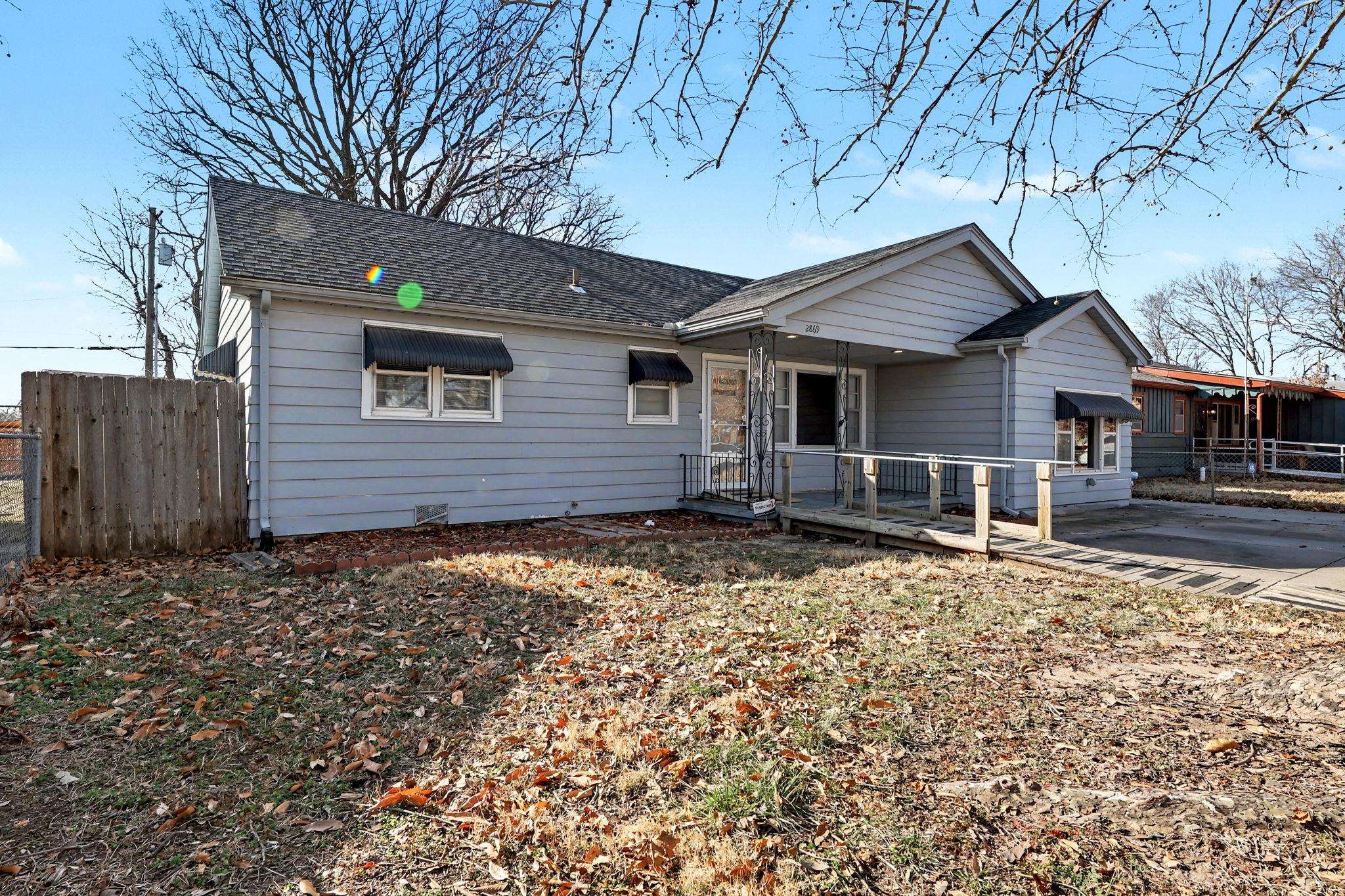 Discover the perfect blend of modern comfort and charm at 2869 S. Mosley, a stunningly updated 4-bedroom, 1-bath home in Wichita. Featuring fresh interior paint, this home offers incredible curb appeal. Inside, enjoy all-new flooring, stylish lighting, and a gorgeous, updated kitchen with new appliances.  In the back yard there is a large, insulated shop/man cave and a privacy-fenced backyard.  Located on a quiet street, walking distance to the Arkansas River and bike paths.  This move-in-ready gem is ready for you!