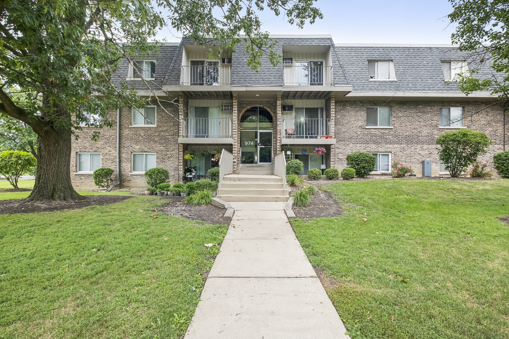 Wow! This spacious condo features 2 bedrooms and 2 bathrooms. Recently rehabbed with attention to detail and high-quality materials. The open, bright kitchen with a lot of cabinets and a large natural stone island that connects to the spacious living room. The home features hardwood floors throughout and a cozy electric fireplace. The large master bedroom includes a private master bathroom and a walk-in closet with built-in shelves. This bright, top-floor unit offers a balcony with panoramic views and enjoys abundant afternoon sunshine. The HOA covers cooking gas, heat, water, and parking. Conveniently located near expressways, Metra, bus stops, and parks, with quick access to restaurants, entertainment, and more