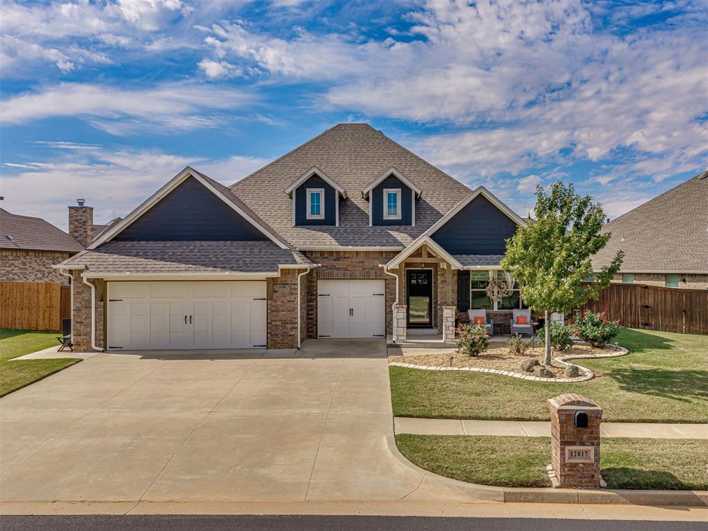Immaculate Taber-built Craftsman-style home in gated Ponderosa Estates, Piedmont Schools! This single-story 4 bed, 2 bath home has been meticulously cared for inside and out. The open living room showcases a striking coffered ceiling, a floor-to-ceiling stacked-stone gas fireplace and abundant natural light, with wood-look tile flowing throughout the main living areas. White cabinetry with illuminated glass-front uppers, quartz countertops and a herringbone backsplash give the kitchen a bright, polished look, complemented by a gas cooktop, double wall ovens and a walk-in pantry. The spacious island features a stainless farmhouse sink and additional seating, keeping the kitchen connected to the living and dining areas. An accent wall adds character to the adjoining dining space. The spacious primary bedroom is tucked away for added privacy and features a tray ceiling. The primary suite offers separate vanities with a makeup station, a corner soaking tub, a tiled walk-in shower and two large walk-in closets. Three additional bedrooms offer flexibility for guests or a home office, while the centrally located laundry room provides everyday convenience. The back patio has been extended and coated with epoxy, with an added wood pergola providing more room for entertaining and a fireplace creating a cozy gathering spot. The spacious backyard features mature landscaping, a custom-built shed and a stained wood fence. The meticulously maintained 3-car garage includes epoxy floors, an overhead storage lift and an in-ground storm shelter. Ponderosa Estates offers two large ponds, nearly 3.5 miles of sidewalk loop, a clubhouse and a large pool, with quick access to the Kilpatrick Turnpike. Less than 10 minutes to Piedmont Early Childhood Center, Stone Ridge Elementary and Stone Ridge Intermediate.