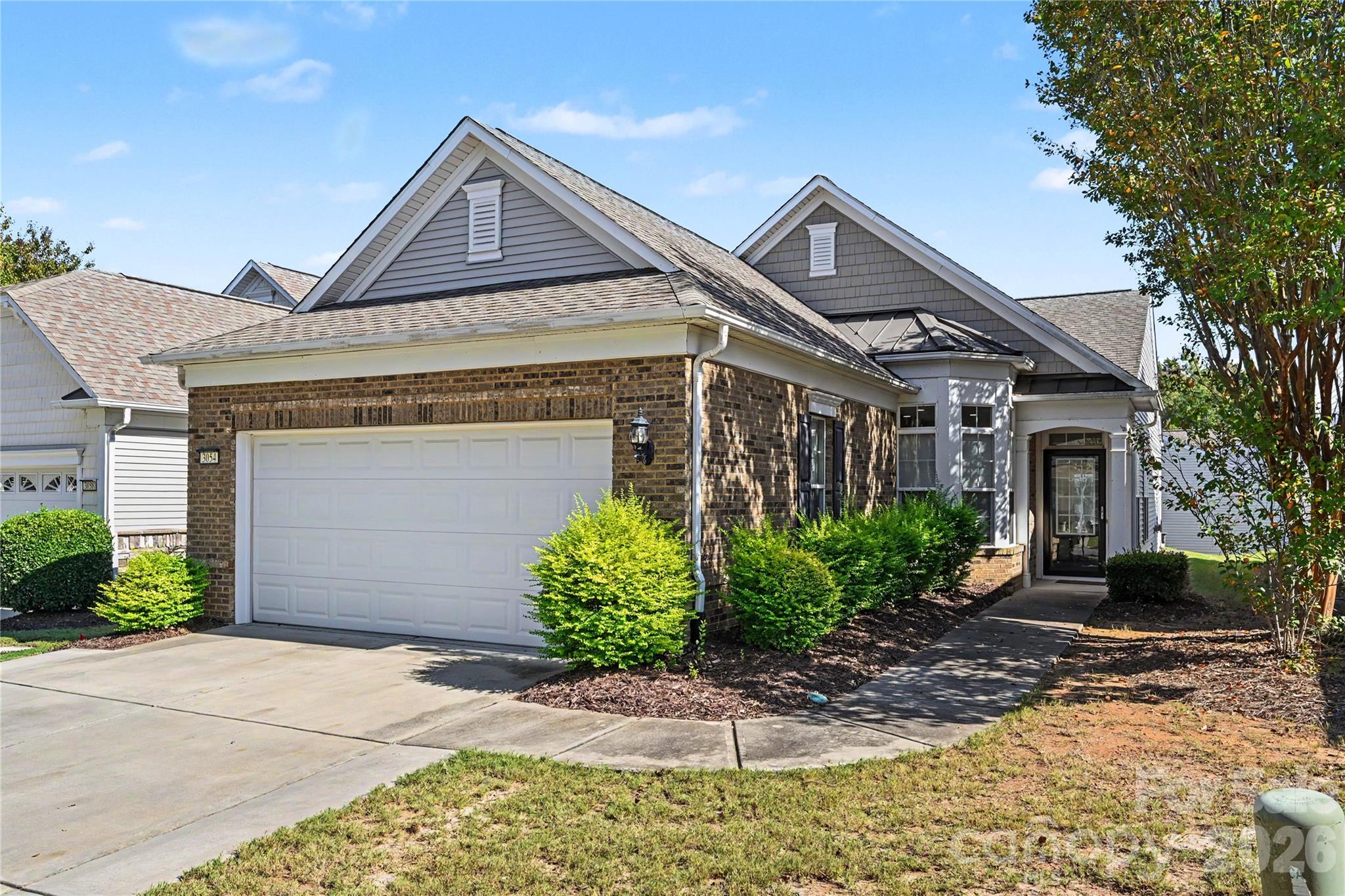 AMAZING 3 BEDROOM/2BATH 1550SF RANCH WITH UPGRADES AND LUXURY PRIMARY BATH!  Located near the front of Sun City Carolina Lakes with easy access to shopping, dining and main roads, this Gray Mist model has NEW Luxury Vinyl Plank flooring THROUGHOUT the home (NO CARPETING).  LUXURIOUS PRIMARY BATHROOM features a ceiling-to-floor tiled oversized Shower with Body Jets, Rain Shower head, and hand-held shower wand, custom tiled floor pan, frameless glass enclosure, quartz countertop, and upgraded fixtures.  Primary Bedroom features POWER REMOTE CONTROL WINDOW SHADES, neutral paint, new LVP flooring, and neutral paint.  Hall Bathroom features tile flooring and upgraded vanity and fixtures.  Kitchen features a Gas Range, tile backsplash, SS appliances, and a cozy Breakfast Nook.  Bright Sunroom features dual sliding glass doors and leads to a patio that's perfect for morning coffee or grilling.  Enjoy the wonderful resort style amenities and activities that have made Sun City such a popular community for a carefree lifestyle!