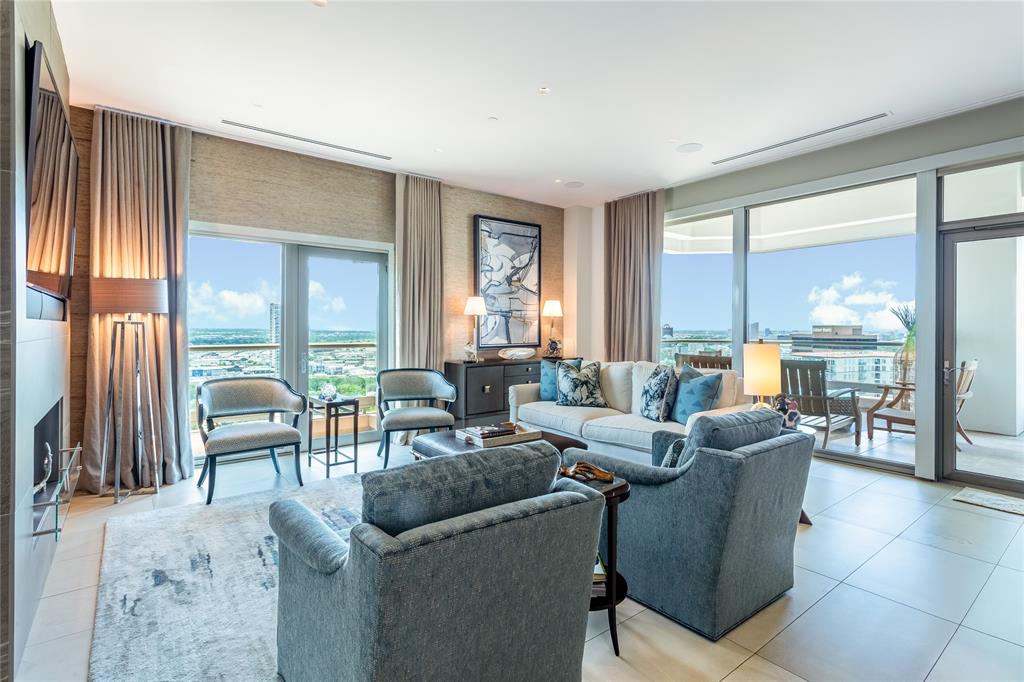 Designed from a shell & offered FURNISHED, this exceptional residence at The Stoneleigh showcases a level of customization rarely found in Dallas high-rise living. Every finish, fixture & detail was thoughtfully selected to create a sophisticated home that is both elegant and highly functional. A private elevator opens to a dramatic Carrara marble-clad vestibule featuring silk grasscloth wallcoverings, custom mirror paneling, designer lighting & a striking pivot entry door. Beyond, expansive living, dining & kitchen spaces unfold beneath walls of glass framing sweeping city & sunset views. Limestone flooring, custom lighting, automated shades & a limestone fireplace wall create an atmosphere that is refined, comfortable & effortlessly livable. The gourmet kitchen serves as the heart of the home, appointed with custom Bentwood cabinetry, premium appliances, leathered stone countertops, a custom island breakfast table & exceptional storage. A private study, currently utilized as a third sleeping area, provides a stylish retreat with dramatic skyline views. The primary suite offers a luxurious escape with a spacious sitting area, custom closets, automated blackout shades & a spa-inspired marble bath featuring a programmable shower, body sprays & rain shower, smart toilet & bespoke cabinetry. The guest suite is equally impressive with designer finishes & a beautifully appointed ensuite bath. Custom wallcoverings, curated lighting & meticulous craftsmanship elevate every room. Residents enjoy one of Dallas' most comprehensive luxury amenity collections, including concierge, valet, owner's lounge, theater, banquet room with catering kitchen, fitness center, dry sauna & steam shower, resort-style pool with spa, outdoor fireplaces, grilling areas & a beautifully landscaped grand lawn. For those seeking a residence that feels distinctly personal rather than developer driven, in fashionable Uptown with myraids of restaurants & entertainment. Prefers close 12-1-26