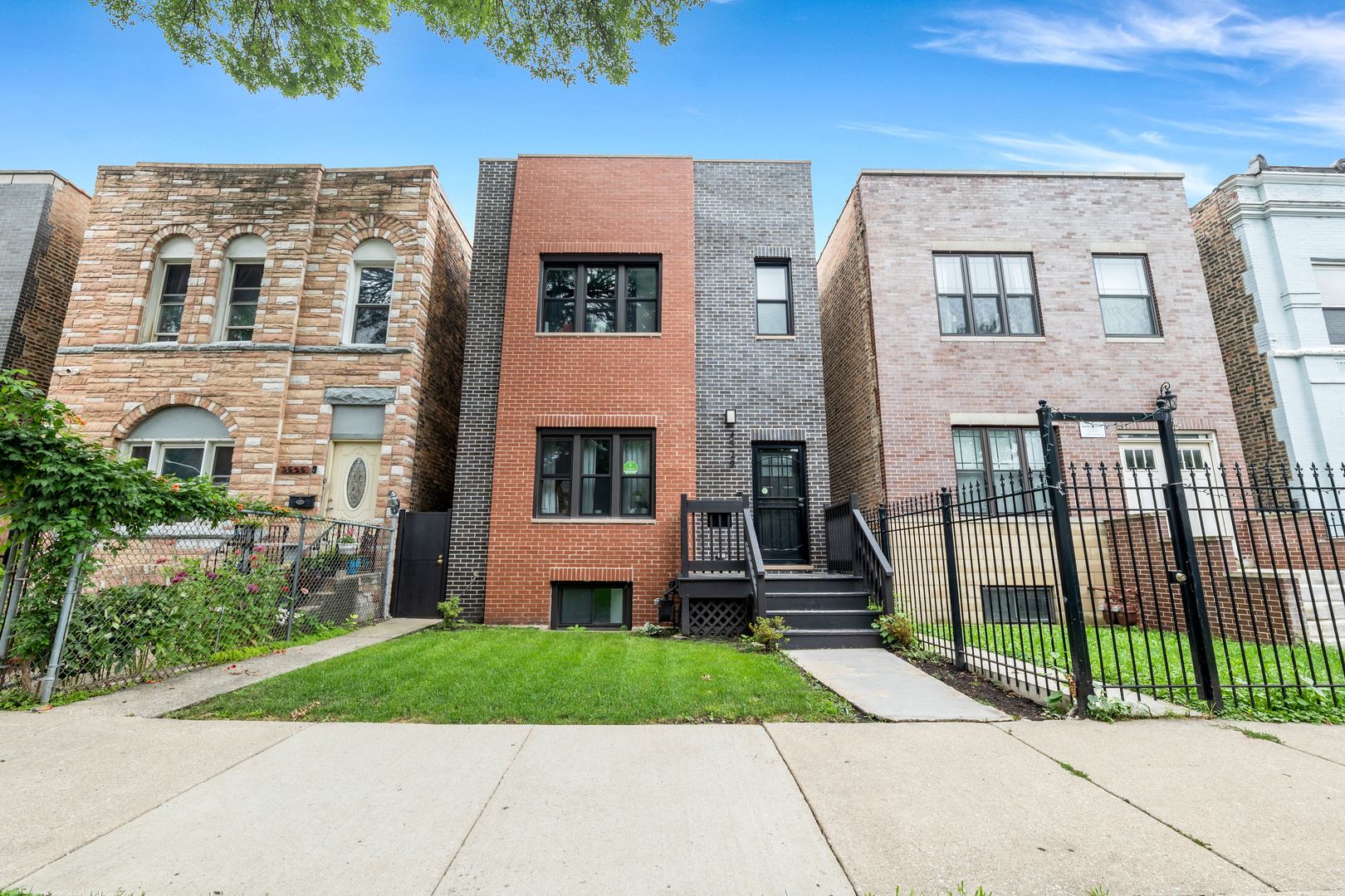 Welcome to 3529 W Le Moyne St, a delightful Chicago residence that seamlessly blends modern updates with timeless character. The first floor offers an open and inviting layout, highlighted by rich hardwood floors and flexible living and dining areas ideal for both entertaining and everyday comfort. The updated kitchen is designed with style and functionality in mind, featuring abundant cabinetry, sleek finishes, and generous workspace. Upstairs, the second floor reveals beautifully refreshed spaces, including a renovated bathroom with a dual vanity, ample storage, contemporary fixtures, and elegant tile flooring. With its thoughtful upgrades and classic charm, this home is the perfect place to enjoy comfortable city living in a prime Chicago location.