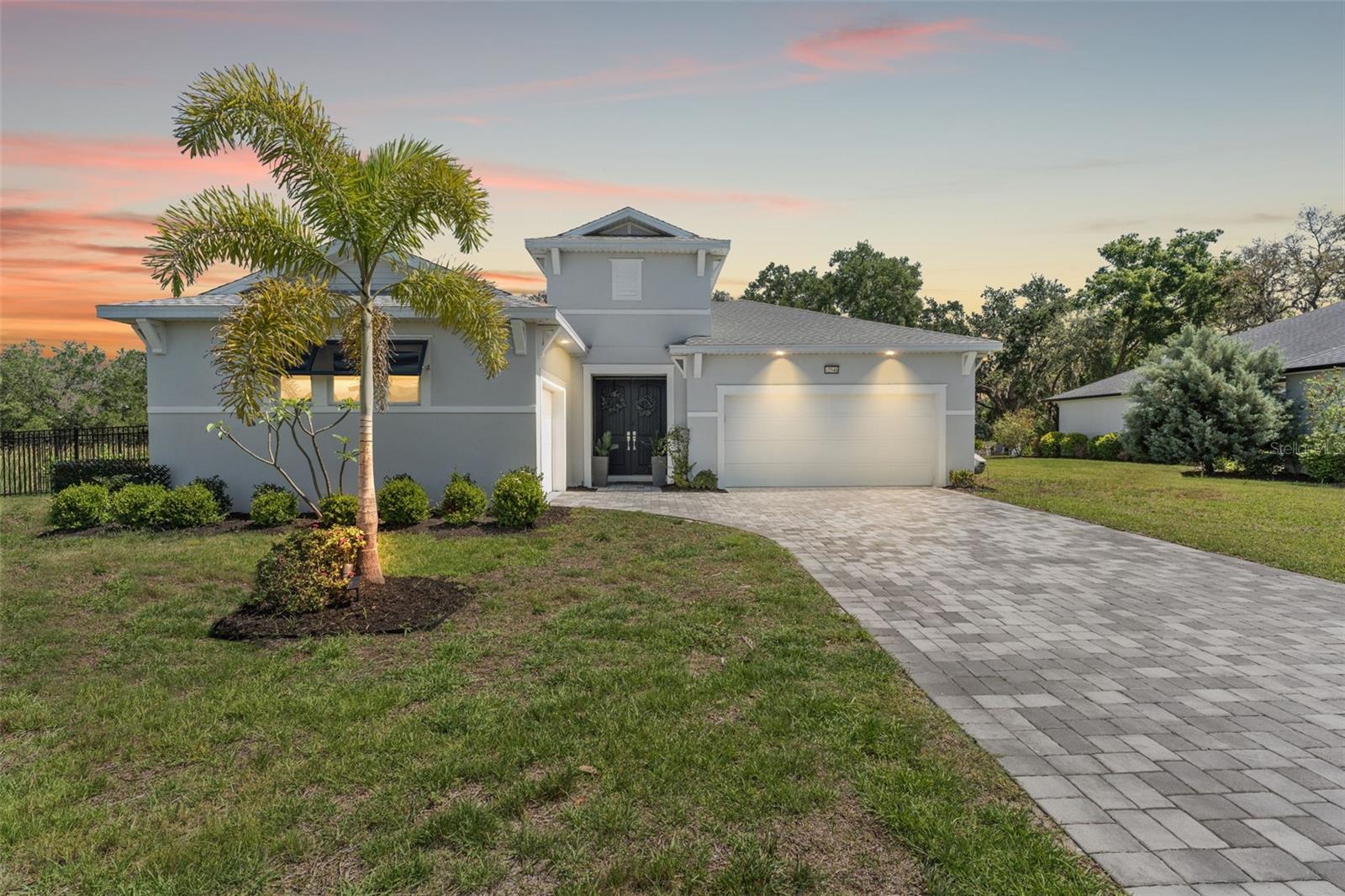 This home qualifies for a 6% Assumable Mortgage. Terms & Restrictions apply. Welcome to Serengeti in Spring Hill; tucked away, yet close to everything, this community is a favorite. Built by DRB Homes (formerly Biscayne Homes), this one features an award-winning floor plan, the Osprey 1 on a corner, oversized lot and pond view. With over 3,400 sq. ft (2,202 heated sq. ft.), three bedrooms, two full bathrooms + a pool bath near the cabana, an open floor plan with Luxury Vinyl Plank flooring, white kitchen cabinets, quartz countertops, a gourmet kitchen with glass cooktop, vent hood, cus, stainless steel appliances and upgraded with the window package. This means larger sliders that open in the middle, the triple picture windows in both the living room and the primary bedroom, allowing for natural light to enter the home at the best times throughout the day. The primary suite has a huge walk-in closet, and upgraded with the wet bath, which includes a soaking tub inside the shower space. Start planning a self-care spa day at home now! One of the best features is that you can see the beautiful pool from several spaces in the house because it sits right in the middle of the home, just like you've seen the movies. Popular in Palm Springs, California homes during the mid-century, these courtyard style homes are great for indoor/outdoor lifestyle for the ultimate entertainer.  Only this one is newer, built in 2023, with all the modern touches you dream of. The pool dimensions are 24 x 16 and 6 ft deep. It's equipped with a heater, an auto fill option, bubbler, fountain jets and auto temp control as well as a cover to keep it warm in the cooler months.The Cabana has an outdoor kitchen with a 10 ft grill by Paradise Grills, it has 350 Rolled steel with dual side burner and back shearer, shelving, sink and refrigerator. The cabana is next to the third garage that could easily be converted to a whole suite, if you have multigenerational living needs. This home has so much potential while it's also a turnkey home. Start your new home journey now and stay forever as you convert this home through all the changes that may come. With three garage spaces, there is plenty of space for storage or a home gym, a man cave, a home-schooling room or even a playroom. The third single garage has a mini split AC Unit, the necessary wiring to install an EV charger. There home is always wired for a security system, and the home is wired with CAT-6 ethernet cabling in all rooms. This area of Spring Hill of east of SR-41 and the home is just off SR-52. Near to shopping, restaurants, major highways, and only 20 minutes from Hudson Beach, FL. About 30 minutes from Weeki Wachee Springs where you can paddle down the crystal clearwater or catch the Mermaid Show. Only a hour to Clearwater Beach, Honeymoon Island and Caladesi State Park. Are you ready to make a move to the sunshine state!? Call to book a tour right away. This home is ready for a new Buyer.