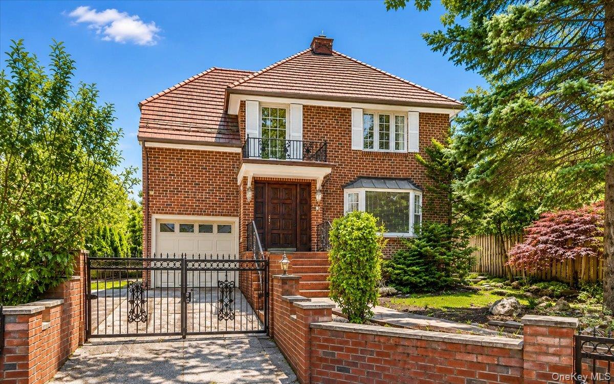 Welcome to Forest Hills Gardens! One of Queens’ most coveted addresses, where classic charm meets modern luxury.Set on a generous 53 x 100 lot, this stunning 5 bedroom, 2.55 bath brick residence has been thoughtfully designed from top to bottom. Wide-plank solid white oak floors and designer finishes run throughout. The custom dual-tone kitchen is the heart of it all, featuring high-end appliances and waterfall quartz countertops that open seamlessly into a formal dining room with a whitewashed wood-burning fireplace, an inviting space made for both everyday living and effortless entertaining. Upstairs, the primary suite impresses with soaring cathedral ceilings, a spa-inspired en-suite with soaking tub, water closet, and radiant heated floors, plus a dedicated walk-in closet. Four additional bedrooms are also on the upper level, alongside a conveniently located laundry room. A spiral staircase leads to a light-filled bonus room with skylights, ideal as a home office or guest retreat. The basement offers generous ceiling height and an open layout, perfect as a playroom or entertainment space. A brand-new heating system serves the entire home for year-round comfort and peace of mind. Step outside to your private backyard oasis, a serene setting ready for summer gatherings.Strategically position for a lifestyle enriched by the vibrant neighborhood with easy access to transportation, express trains and LIRR. The Nature Trails in Forest Park offers amazing hikes. Close distance to supermarkets, movie theater, restaurants and shops. Zoned for PS101 in the Gardens. Enjoy the charm of this quaint neighborhood with the convenience of a short commute to Manhattan. Seize the opportunity to own a residence that harmonizes modern luxury with the timeless appeal of Forest Hills Gardens.