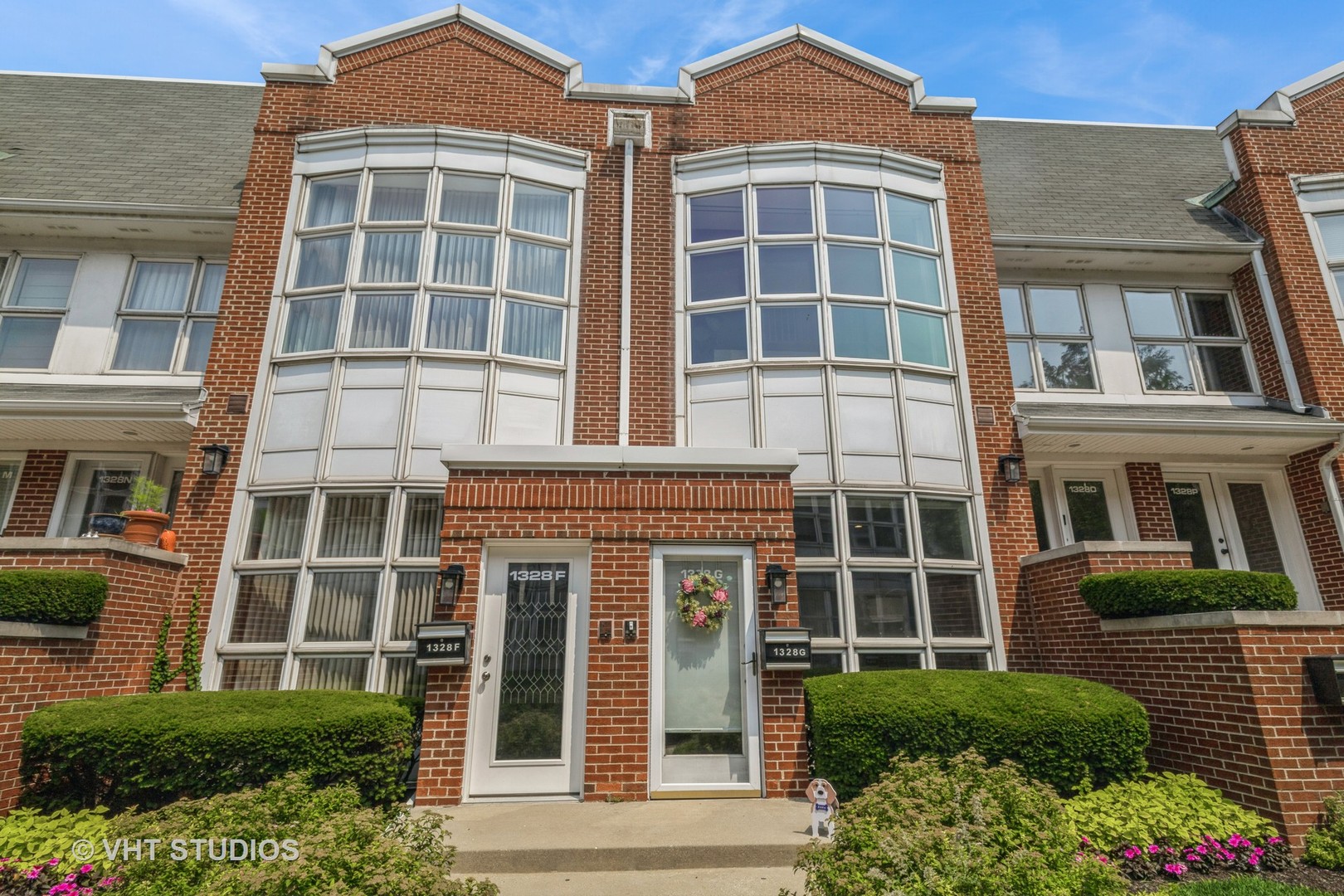 Rarely available townhome in the highly sought-after Dearborn Park II community of Chicago's vibrant South Loop. This spectacular, sun-drenched 2-bedroom, 2-bath home features a large bay window that fills the cozy living room with natural light, a fireplace, and hardwood floors throughout. The updated kitchen offers gray quartz countertops, stainless steel appliances, and a separate dining area. The spacious primary bedroom includes an ensuite bath, while both bedrooms provide access to the private balcony. The laundry room includes an updated washer/dryer, ample storage, and a massive crawl space under the living room for additional storage. Enjoy the convenience of an attached 1-car garage. Perfect location-just steps to South Loop Elementary, Cotton Tail Park, Mariano's, Jewel, Trader Joe's, local shops, restaurants, and public transportation.