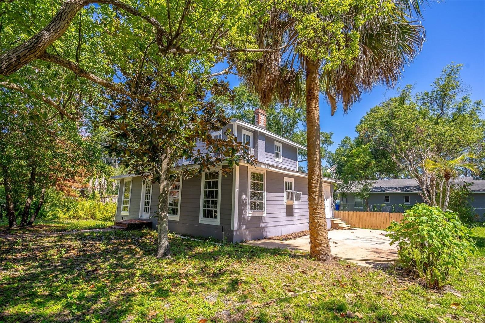 Back on Market!  Sale was contingent on Buyers sale of another property and that sale fell through.  Large corner lot near downtown Kissimmee.  1926 home with wood burning stove.  32' x 11' oversized Shed/Storage.  Termite protection contract with Terminix paid thru April 2027, Hardie board siding installed 2022, solar panels, irrigation system.