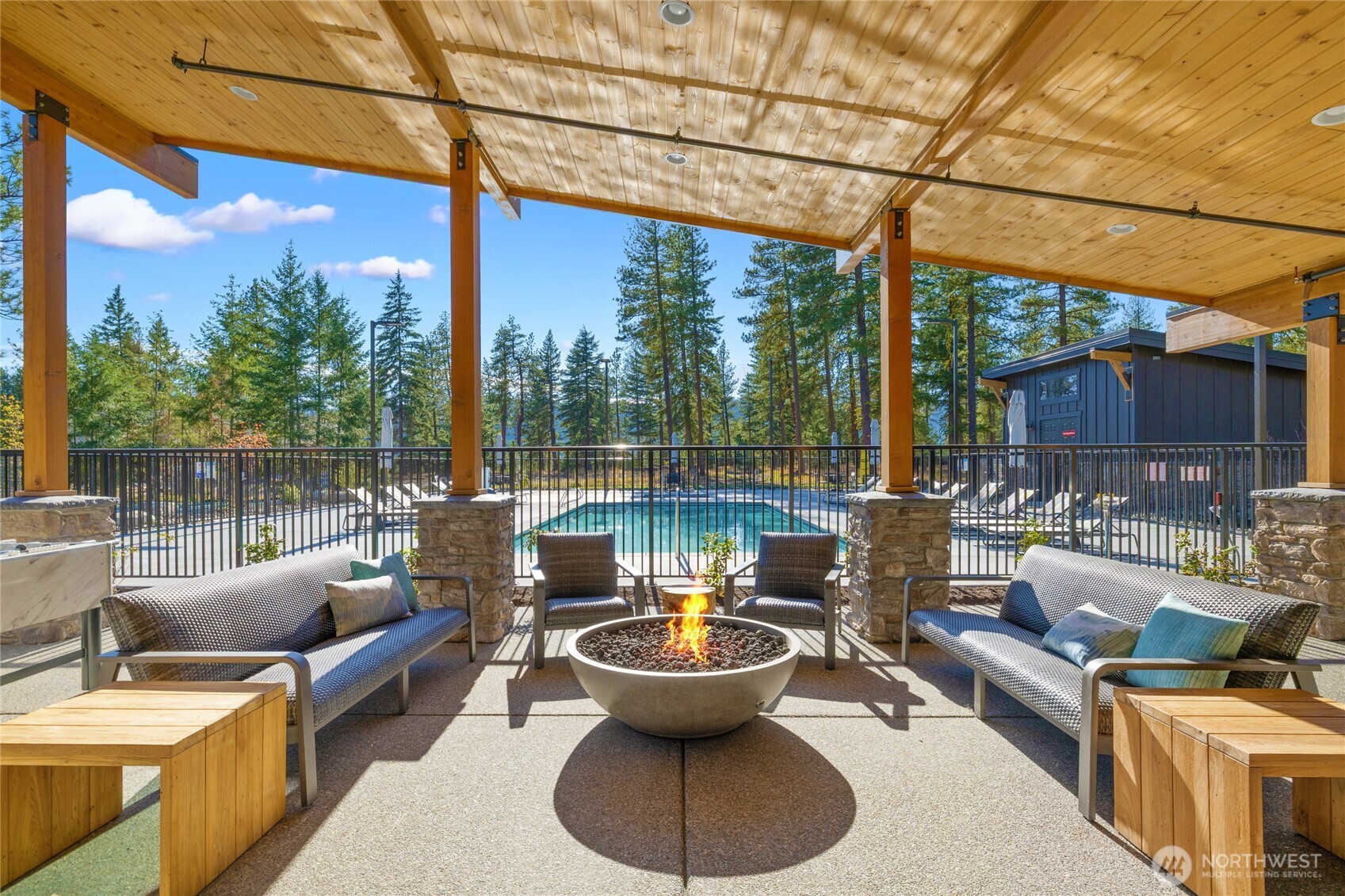 Clubhouse with large, covered patio and gas firepit.