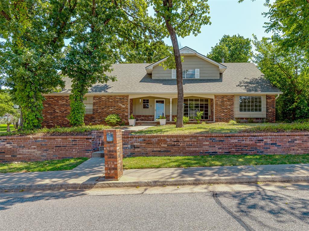 Wonderful 5-Bedroom home in Prime Edmond Location! Fabulous updates throughout!  Move-in ready with all-new carpet, updated wood flooring, fresh paint throughout, modern lighting, brand new AC, and a new storage shed. Spacious 2-story layout with dual-zone HVAC (Nest thermostats, high-efficiency furnace downstairs). Remodeled kitchen with quartz countertops, 5-burner gas stove, stainless steel appliances, shiplap ceiling, and brick backsplash. Large open living room, formal dining with built-in hutch (or office), and flexible downstairs bedroom with full bath. Upstairs features the primary suite plus 3 large bedrooms and another full bath. Enjoy the covered patio, paver patio/walkway, mature trees, and sprinkler-maintained fescue lawn—all on a corner lot just minutes from Edmond Memorial High School!