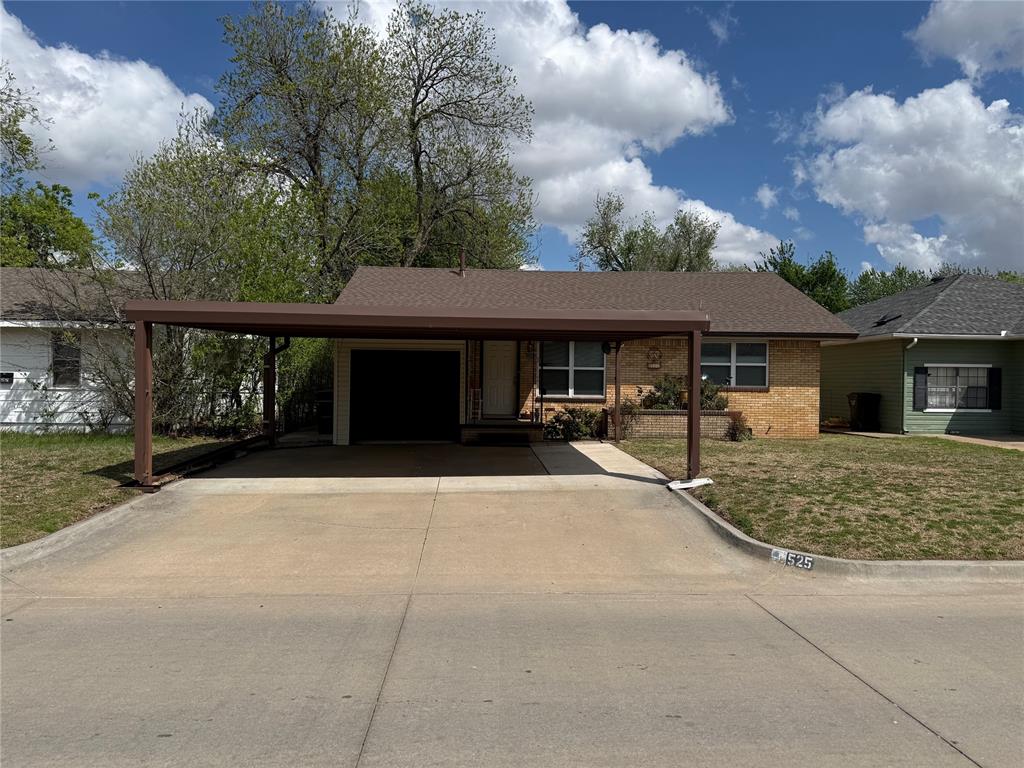 Vintage Charmer, This home features  updated windows, New roof, 2 car carport, covered patio, large backyard, hard wood floors in living room, loft area off kitchen for storage or kids hideout.