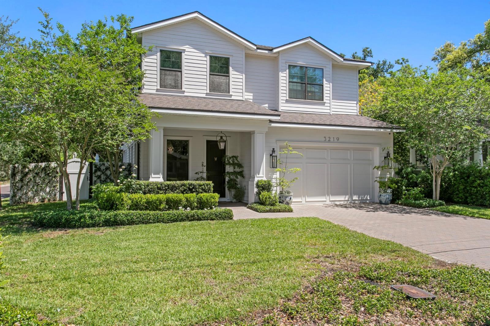 Located in the heart of Palma Ceia on charming brick streets, this beautifully customized 2020-built home sits on a prime corner lot just moments from Bayshore Boulevard, top-rated schools, and South Tampa's best dining and shopping.The backyard is the true standout - designed as a private, resort-style retreat with lush landscaping for complete privacy. A stunning pool and spa with water features and sun shelf, expansive turf, and a separate gas fireplace lounge create an outdoor space ideal for both everyday living and entertaining.Inside, curated designer finishes elevate every space, including custom wallpaper, statement lighting, and refined plumbing fixtures. The kitchen features quartz countertops with a full slab backsplash, high-end gas range, oversized refrigeration, and a bright breakfast nook overlooking the backyard. The family room is anchored by a custom gas fireplace.All four bedrooms are located upstairs along with a well-appointed laundry room. The primary suite offers two spacious custom closets and a marble bathroom with double-door entry, featuring a walk-in shower and separate soaking tub.Additional highlights include a custom mudroom with floor-to-ceiling cabinetry, impact windows, whole-home generator, water filtration and softening systems, and a desirable Flood Zone X location.