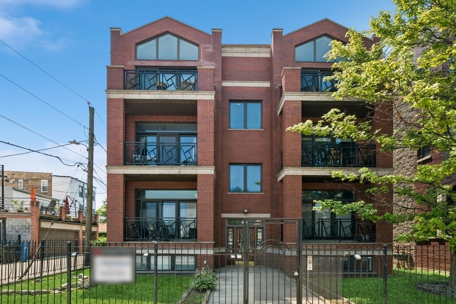 Welcome to this extra-wide 3 bedroom, 3 bathroom duplex-down in one of Chicago's most sought-after neighborhoods - Ukrainian Village. Offering 2,400 square feet across two levels, this home provides a smart layout with generous living spaces and thoughtful updates throughout. Features include updated modern kitchen cabinetry, custom paint, two fireplaces, large lower family room, side by side washer/dryer, master suite with built ins and garage parking. The lower level includes a private guest suite (ideal for visitors, a home office, or additional living space). Generous outdoor space with both a private back deck and front balcony. Fantastic location close to Damen Street shopping and restaurants, Mariano's, Wicker Park, Smith Park, Humboldt Park, Western Metra and so much more.