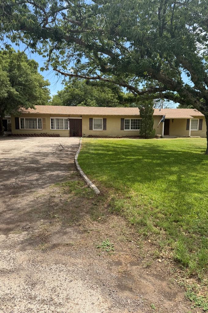 This unique distinctive home features 4 bedroom, 3 bath, 3 living areas with a grand slate stone fireplace in the Odessa Country Club on .766 of an acre. Equipped with a water well and separate guest house in the back that produces extra monthly income or mother-in-law quarters. Plenty of room for a shop or in ground pool. Don't miss out on this  one!