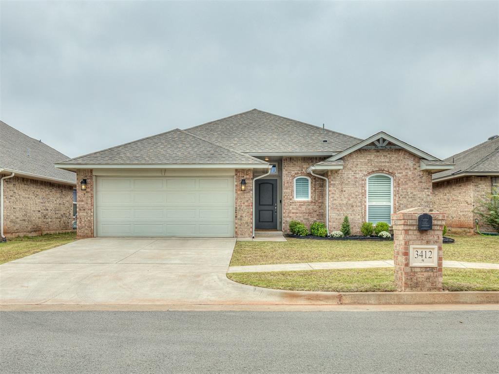 This SHOWSTOPPER in The Grove is a must see! Truly immaculate home with so many extras including custom PLANTATION SHUTTERS in the award-winning Deer Creek School District. Built in 2021, this home features 3 bedrooms, 2 bathrooms with a split layout. The gourmet kitchen shines with quartz countertops, stainless steel appliances including a gas stove and built-in microwave, wood-stained cabinets and a spacious pantry. It flows seamlessly into the dining area and open-concept living room with a cozy gas fireplace. The primary suite is a true retreat with large windows, dual sinks, a walk-in tiled shower, garden soaker tub and an oversized walk-in closet. Secondary bedrooms are generously sized with big closets. Upgrades throughout include wood-look tile in the kitchen, living and dining room, high-end light fixtures, crown molding, ceiling fans, a security system with water sensors and a tankless hot water heater. This property is as functional as it is beautiful. The backyard features a covered patio, perfect for entertaining. The Grove offers an unmatched lifestyle with two community pools, two fitness centers, multiple playgrounds, a basketball court, soccer field, stocked fishing ponds, and miles of scenic walking trails—all within the neighborhood! Just minutes from major highways, shopping, dining, and entertainment! Schedule your private tour today!