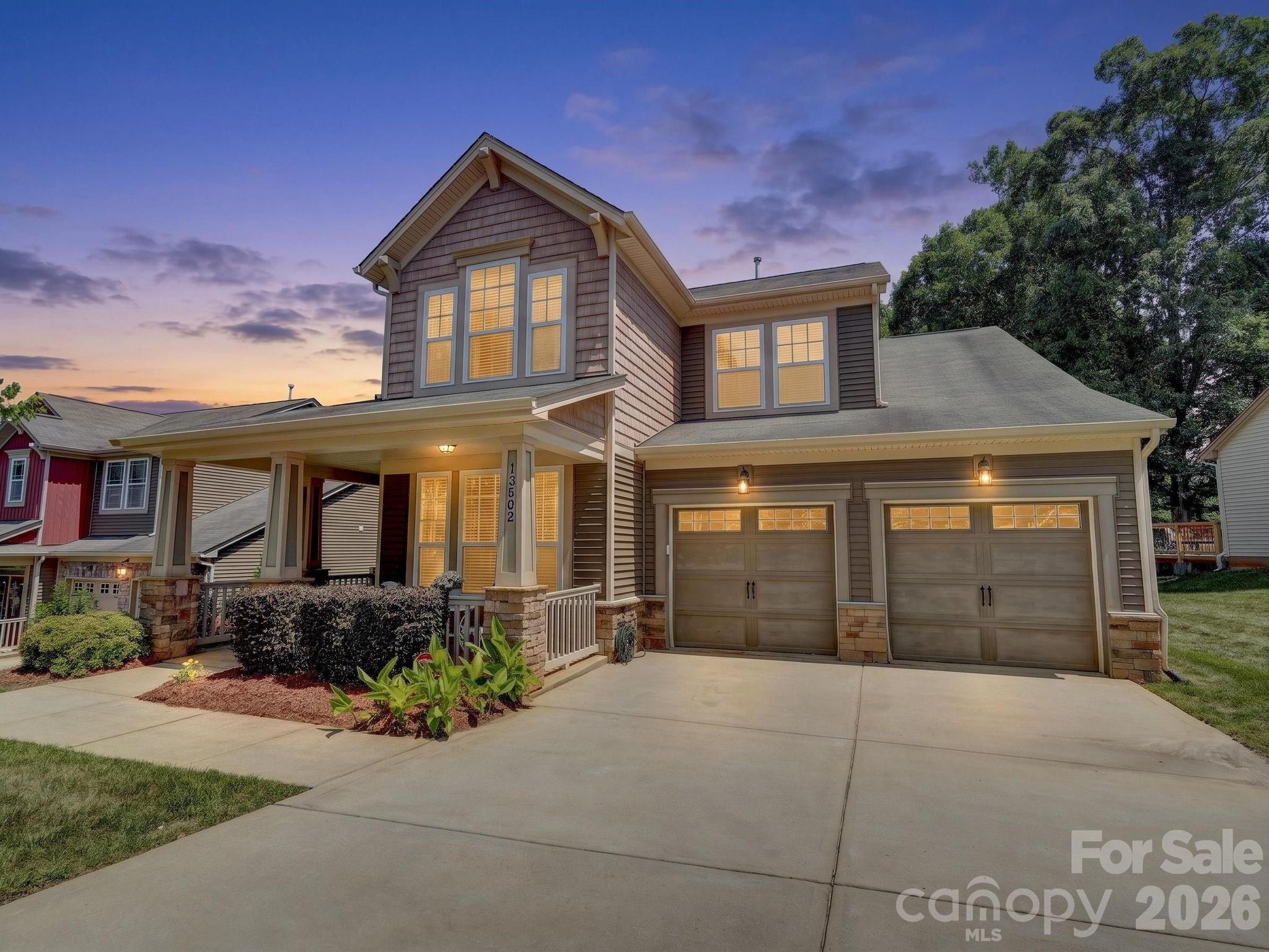 Located on a premium lot in The Enclave, this home is packed with style and functionality. Fantastic curb appeal welcomes you with a relaxing front porch and mature landscaping. Prepare to be impressed inside by the two-story foyer and gorgeous curved staircase. There’s a spacious formal dining room that could also serve as a great home office option. The kitchen is beautifully appointed with granite countertops, stainless steel appliances, an island, and an additional wall of built-ins offering fantastic storage. It opens to a second dining area and the living room, complete with a tray ceiling and gas fireplace. The main level also features a powder room and convenient drop zone area. Upstairs, relax in the second hangout space, a loft/flex room currently used as a den (could also be closed in to be bedroom 4). The primary suite is privately situated at the back of the home and features a bath with dual vanities, a shower, soaking tub, and not one, but TWO walk-in closets. The two secondary bedrooms are both spacious, including one with a vaulted ceiling, and share a well-appointed hall bath. Laundry is conveniently located just outside the bedrooms. Grill out on the back patio overlooking one of the best backyards in the community — flat, fully fenced, and ready for summer enjoyment. Speaking of summer, the home also features a brand new AC, just installed. Conveniently located just four minutes from RiverGate Shopping Center and only 10 minutes from Lake Wylie boat access. Welcome home!