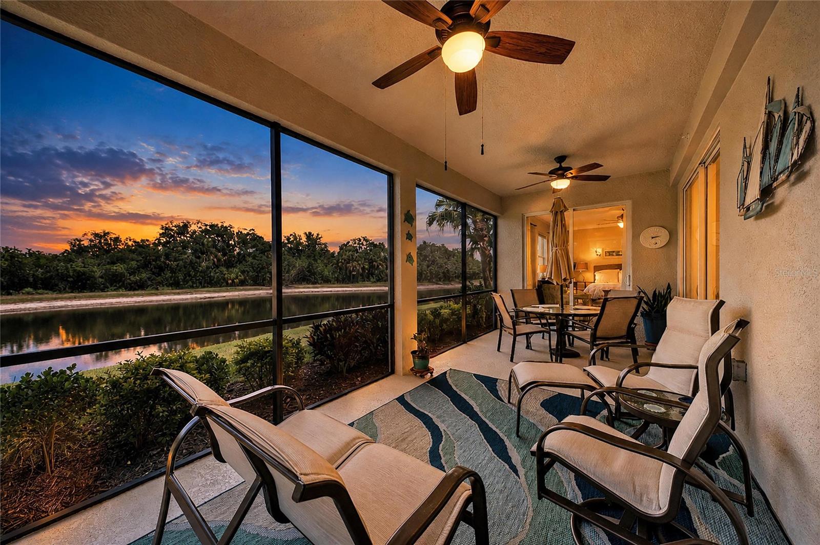 Welcome to one of River Strand Golf & Country Club's most desirable Coach Homes, where an exceptional location, breathtaking views, and meticulous updates come together to create the ultimate Florida lifestyle. Perfectly positioned on a premium homesite with no neighboring building to the side, this golf-deeded residence offers a rare sense of privacy surrounded by lush preserve views, tranquil water vistas, and abundant wildlife. Every morning begins with spectacular sunrises from the screened lanai, creating a peaceful retreat that truly feels like your own private tropical oasis. Location is everything, and this home delivers. Just a short five-minute stroll to River Strand's spectacular clubhouse, you’ll enjoy  the over $9 million recently completed renovations, including the stunning new clubhouse, dining room, bar and tiki bar and enhanced resort-style amenities—all without the burden of additional renovation costs. Outside the gates, you'll appreciate unmatched convenience with Costco, Target, Hobby Lobby, Academy Sports, and numerous dining options just minutes away, while the future Whole Foods further enhances the area's appeal. With I-75 less than 10 minutes away, Sarasota, Lakewood Ranch, UTC, world-class beaches, and airports are all within easy reach. Lovingly maintained by its original owners and never offered as a rental, this immaculate home reflects pride of ownership throughout.  Owners are non-smokers, have no pets and the unit has no stairs.  A new HVAC system (2022), washer and dryer (2020), and a beautifully updated kitchen featuring Samsung stainless steel appliances—including the refrigerator, range, microwave, and dishwasher—provide modern comfort and peace of mind. Elegant finishes elevate every space, including custom Sherwin-Williams designer paint throughout the home and ceilings, crown molding in the living room, dining room, primary suite, and primary bath, along with updated designer lighting in the kitchen, breakfast nook, dining room, hallway, primary bath, and guest bath. Ceiling fans throughout the home and lanai enhance year-round comfort, while additional upgrades include newer carpeting in all bedrooms, updated dimmer switches, upgraded showerheads, a utility sink in the garage, and an insulated garage door. Completing the home's exceptional presentation, the exterior and lanai were freshly painted in February 2025, giving the building a crisp, contemporary appearance. Offering an unparalleled combination of privacy, panoramic preserve and water views, thoughtful upgrades, golf membership, and resort-style living in one of the most sought-after locations in the Bradenton-Sarasota area, River Strand Golf & Country Club is a a 27-hole Arthur Hills designed golf course, 9 Har-Tru Tennis Courts, 8 Pickleball courts, 2 Resort-Style Pools, 6 Satellite Pools, Community Center & 2 fitness centers in this luxury gated community with 24 hr. security & lawn maintenance. This exceptional residence represents luxury Florida living at its finest.  River Strand Golf & Country Club More than a Community, It’s a Lifestyle.