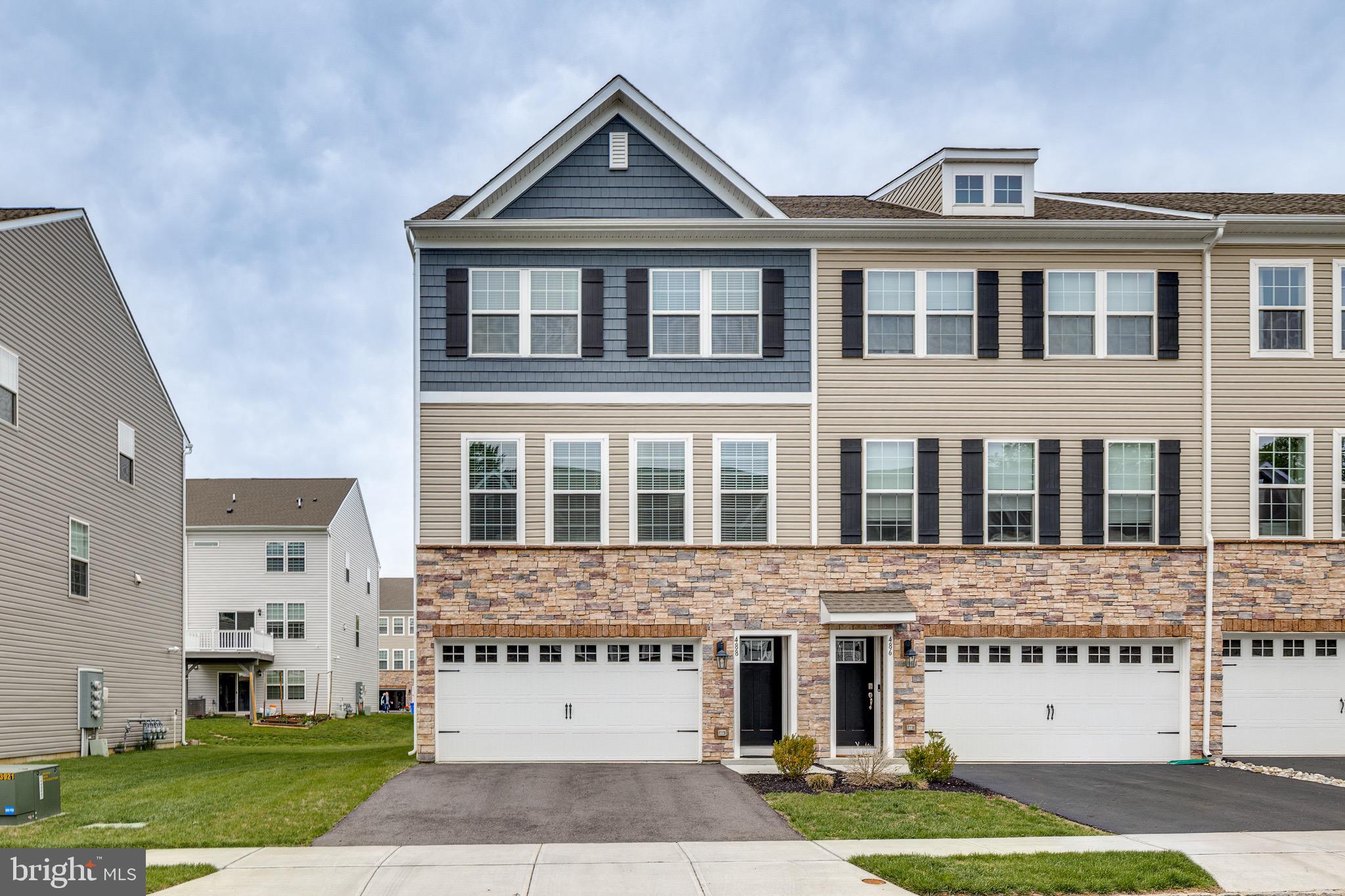 Don’t blink or you might miss this spectacular three story END UNIT townhome in the desirable neighborhood of the Gables of Mount Laurel.  Gorgeous and updated from top to bottom.  You will instantly feel a sense of spaciousness and style with clean crisp upgraded finishes, neutral tones throughout and an abundance of natural light.  This amazing two year old, fully upgraded townhome has all the bells and whistles you are looking for. This home offers three bedrooms with two full baths and one half bath.  A split staircase provides access to all of the levels starting with the lower level which features a spacious family room with cozy cream colored carpet, a sliding glass door that opens to the backyard and access to the two car garage.  The open concept main level features 9 foot ceilings and gorgeous engineered hardwood floors throughout.  This space can be defined in many ways based on your personal needs and includes areas that are traditionally used as a living room, dining room and eat in kitchen area.  The gourmet kitchen features an oversized island, lots of marble counter space, stainless steel appliances, gas cooking, an oversided sink and a pantry closet.  There are tons of windows and a sliding glass door which will lead out to the deck.  Because the end unit includes windows on three sides, the natural light on this main level is unbeatable.  The upper level features an incredibly large primary bedroom suite.  There is a large walk in closets and the primary bathroom has a stand up shower and a double sink vanity. To complete this level there are two additional bedrooms that share a half bath and the laundry room.  Additional features in the home include recessed lighting in several rooms,  "Home is Connected" home automation system, two thermostats that control additional dampers to maximize air flow which can be problematic in the large townhomes.  The upstairs cools very effectively in this home because of this upgrade.  You will love the terrific accessibility to the excellent Mt. Laurel township schools, renowned restaurants, houses of worship, upscale & everyday shopping, points of interest, nightlife and recreational destinations.  Close to major roadways including Routes 38, 73, 70 & 295 and the NJ Turnpike.  Come tour this amazing home!