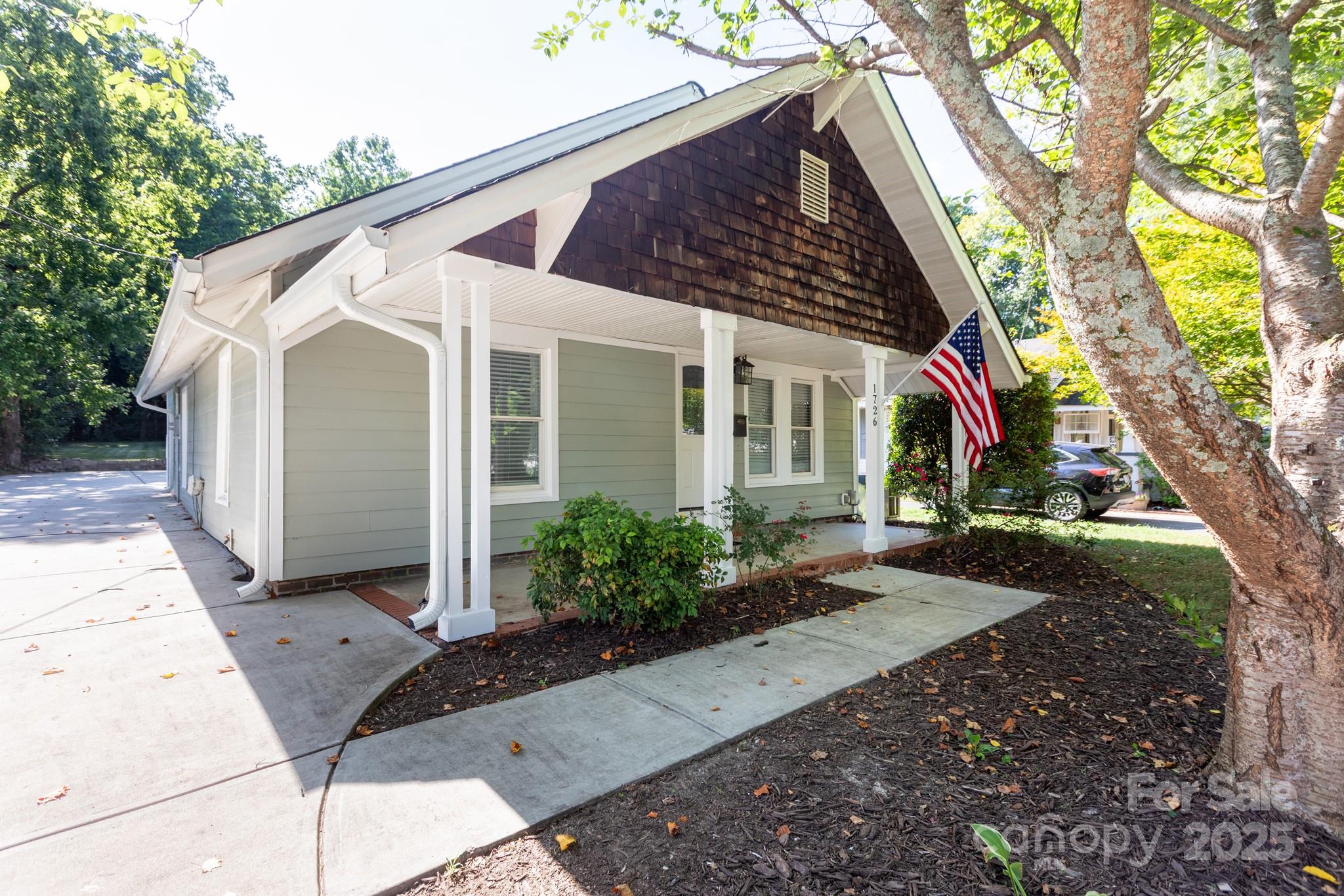 Fantastic bungalow in Medford Acres.  Home is mins to Uptown, Plaza Midwood, NODA and so much more.  This open floor plan is great for entertaining either on the covered front porch or on the large back deck.  The split bedroom floor plan is great for guest or roommates.  Home features new cabinets, quartz countertops, updated appliances including microwave/dishwasher/gas range/washer/dryer/electric water heater.   Roof is 2024 and heat pack 2019