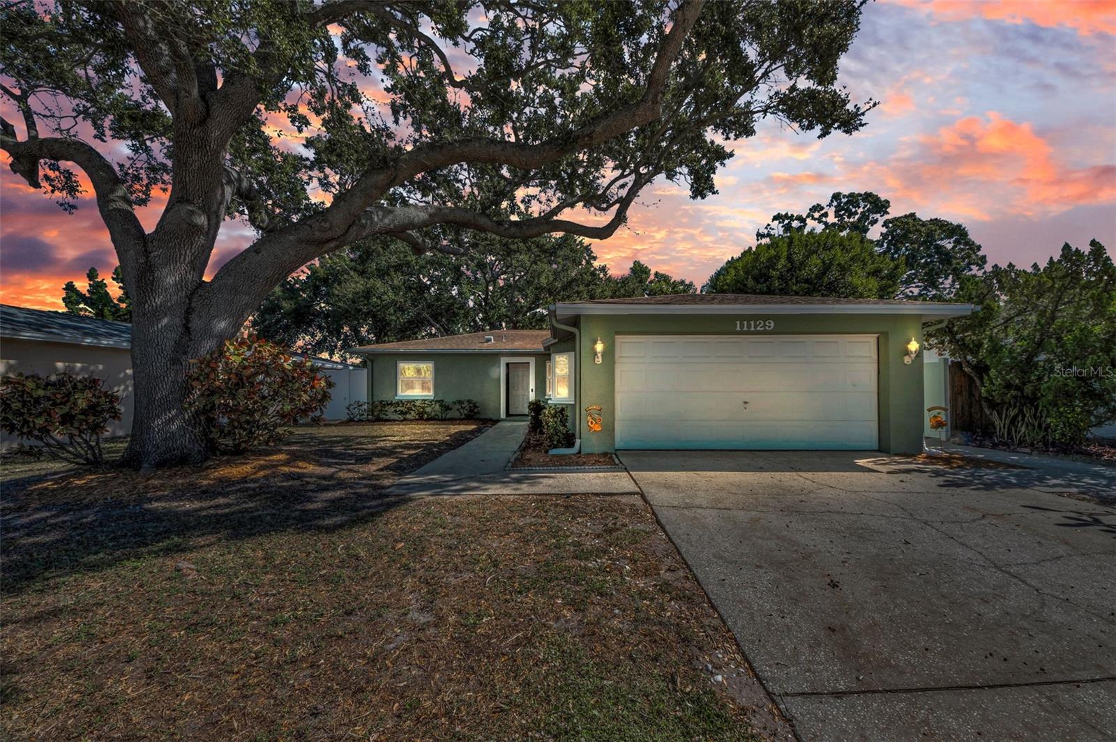 Welcome to this beautifully updated 3-bedroom, 2-bath single-family home offering 1,494 square feet of comfortable living space in a non-flood zone neighborhood of Pinellas Park, Florida. This home is perfect for those seeking a blend of modern upgrades, convenience, and proximity to the best of Tampa Bay living. Recent improvements include: New flooring, and kitchen remodel (2019), Energy-efficient windows (2023), , Fresh interior paint and new backyard fence (October 2025). The garage has been thoughtfully finished into a spacious family room, while retaining the garage door and additional storage space—ideal for flexible living or entertainment needs. Enjoy the outdoors in your private, fenced backyard, perfect for relaxing or hosting gatherings. Reclaimed water irrigation system for eco-friendly landscaping. Roof 2016. Located just 25 minutes from the stunning Gulf beaches and 25 minutes to Airport, this home offers easy access to shopping, dining, parks, and major roadways. Whether you're a first-time buyer, relocating, or looking for a seasonal retreat, this home is ready for move-in before the end of 2025. Don’t miss your chance to own a well-maintained property in a desirable Pinellas County location.