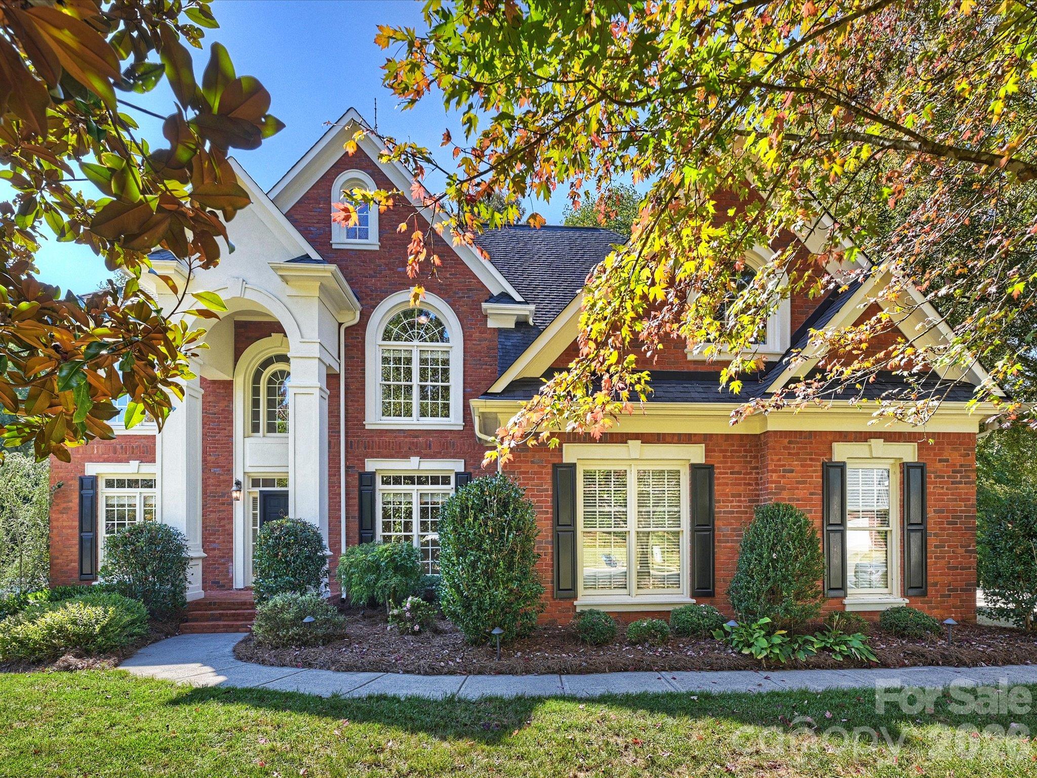 Welcome home to Weddington Chase!  A wonderful opportunity to get into this very desirable neighborhood in Marvin School district.  This beautiful, brick five-bedroom home features a double story great room with incredible natural light and stunning views of the wooded lot.  The eat-in kitchen opens to the great room creating a perfect setting for living and entertaining.  The main floor also features formal living and dining rooms, a guest bedroom, a laundry room and an incredible screened-in porch.  Upstairs the primary suite has a beautiful picture window, tray ceiling, double closets, a huge primary bath with shower and soaking tub and a flex space off the primary that may be used as an office, an exercise room, meditation or private den.  Three secondary bedrooms include an en-suite bedroom and shared bath bedrooms.  The third floor offers incredible space to spread out for work or play or an additional guest space.  There is plumbing in place for a fifth bathroom should the new owner prefer a full bath on this level.  The outdoor living is exceptional here, with a spacious elevated screened-in porch off the kitchen and an additional large open deck that looks out to a lawn for play space and a wooded natural area that includes space for a fire pit.  Weddington Chase offers fabulous community pools, walking trails, tennis, pickleball and a beautiful clubhouse.  Welcome home to Stonehaven Drive!