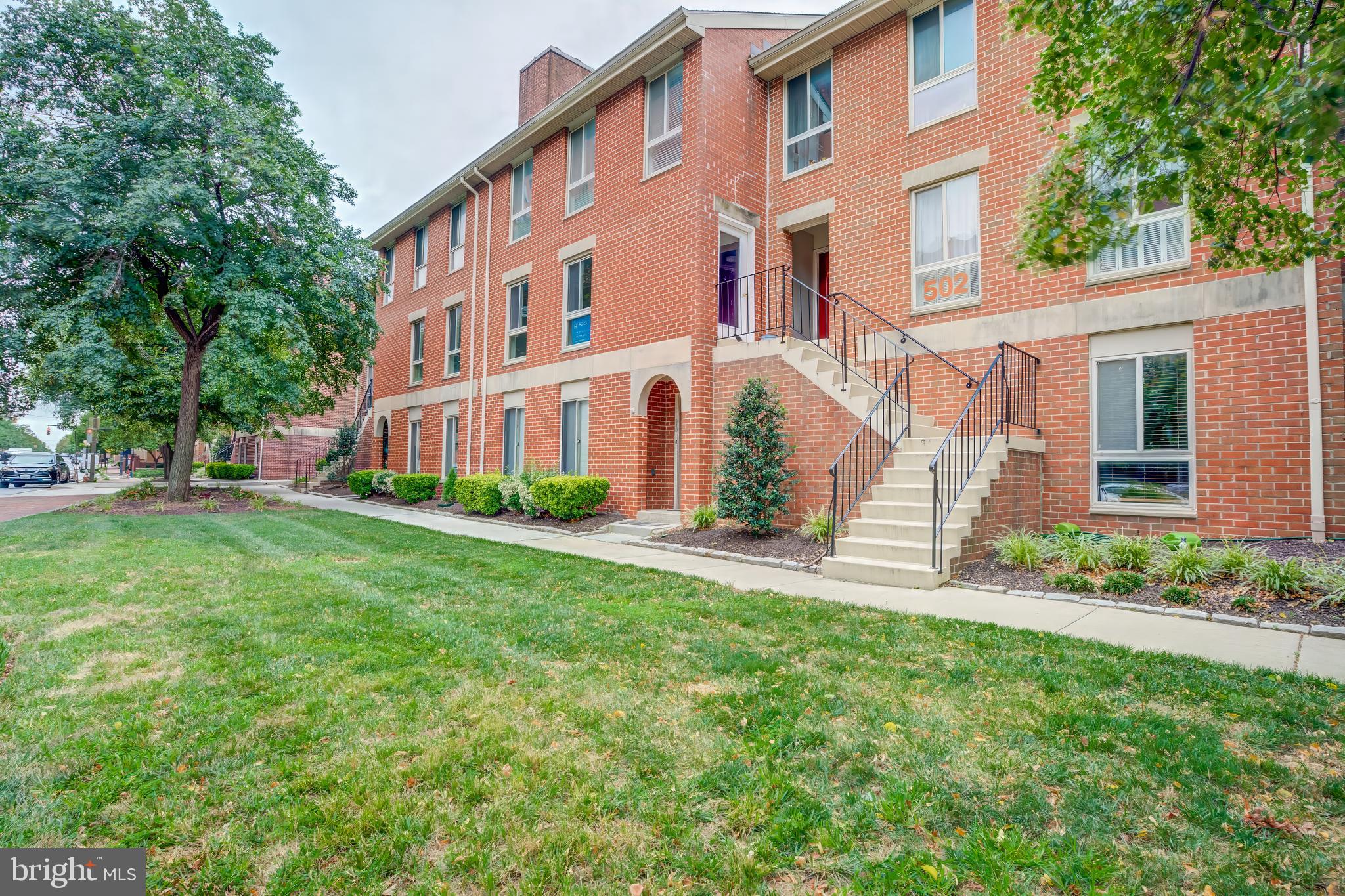 Welcome to 506 S Charles St #R92 in historic Otterbein—an airy 2BR/2BA condo with an open floor plan, wood‑burning fireplace, and hardwood floors throughout. Set on the 2nd floor for enhanced neighborhood/treetop views, the sun‑filled living and dining area flows seamlessly for everyday living and easy entertaining. Two well‑sized bedrooms and two full baths offer comfortable flexibility for guests or a home office. Assigned, gated parking conveys—rare and convenient for city living. Unbeatable location just minutes to the Inner Harbor, Downtown, Federal Hill, M&T Bank Stadium, Camden Yards, and countless shops and restaurants. Enjoy low‑maintenance living in the heart of Baltimore with everything you love right outside your door.