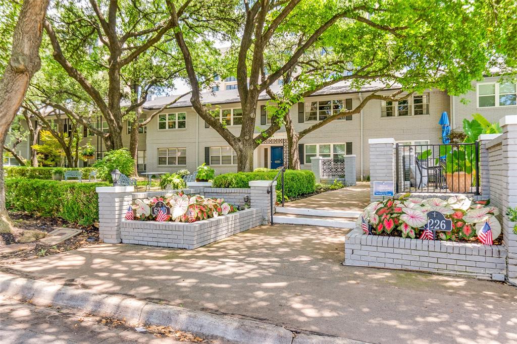 New Dishwasher., New Range, New Microwave. New Flooring in Kitchen, Laundry Room, and Upgraded Primary Bath. Spacious First Floor 2 Bedroom 2 Bath 1794 square foot Condo Behind the Pink Wall offers 2 convenient Side by Side Carport Spaces just outside the back door.   Priced below DCAD Value.Large Living Room and Dining Room feature Parquet Wood Flooring.  Kitchen has room for a casual Dining Area.Primary and Secondary Bedrooms have separate entry halls, Ensuite Baths and lots of Closet SpaceLaundry Room features Full Size Washer and Dryer.Original Federal Pacific Electrical Panel has been Replaced.  Original HVAC Air Handler was replaced in 2022.Refrigerator, Washer and Dryer Included.