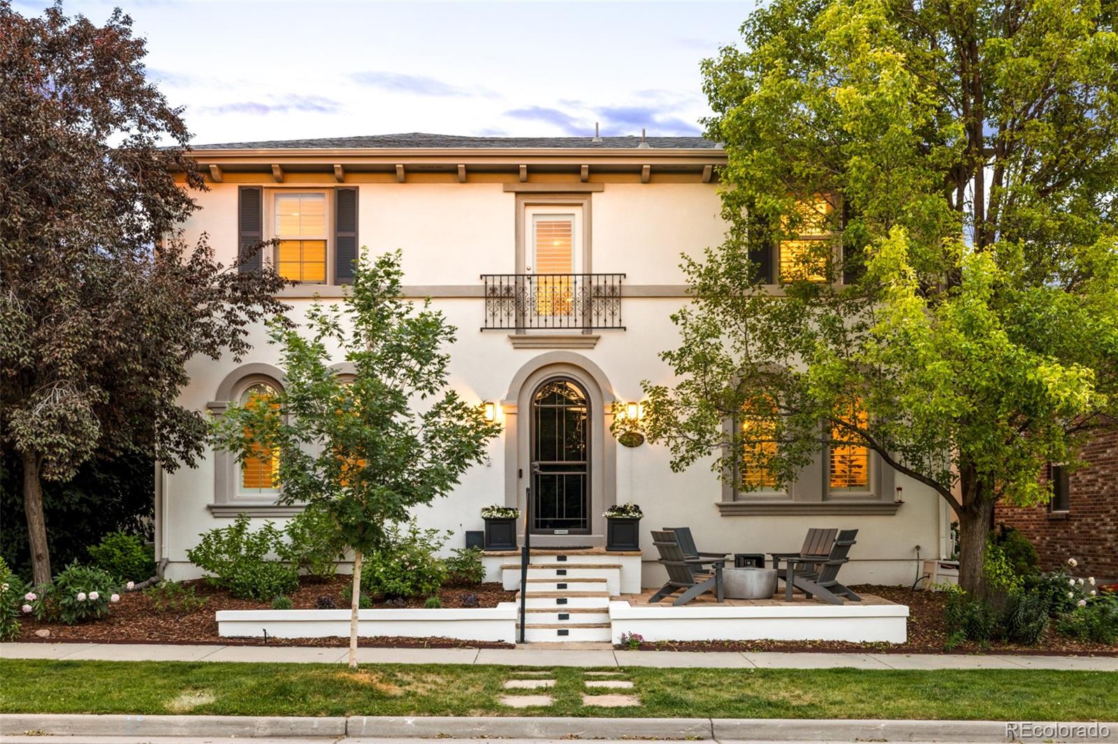 Positioned on a quiet park in the Eastbridge community of Central Park, this exceptional residence delivers a rare combination of elevated design and effortless livability. Sweeping mountain views grace the front of the home, while three distinct outdoor living spaces — including a Juliet door off the primary suite — create a seamless connection to the scenery. The interiors have been updated top to bottom with curated neutral finishes, beginning with a sunlit office, elegant dining room with classic shutters and a butler's pantry complete with a full-size freezer and pantry with pull-out shelving. The chef's kitchen anchors the home with a large center island and a bright breakfast nook. The great room impresses with two-story ceilings, a fireplace and custom built-ins. The primary suite offers a serene bath with a soaking tub and walk-in shower. Below, a finished basement balances adventure and comfort — featuring a climbing wall alongside a cozy fireplace. Outside, a pergola, deck and outdoor fireplace complete this extraordinary offering. Ideally situated in the heart of Eastbridge, this home offers an exceptional lifestyle just moments from Eastbridge Town Center, the Stanley Marketplace and the Central Park rec center . While miles of walking and biking trails weave throughout the neighborhood, connecting parks, open space, and some of Central Park's most beloved destinations.