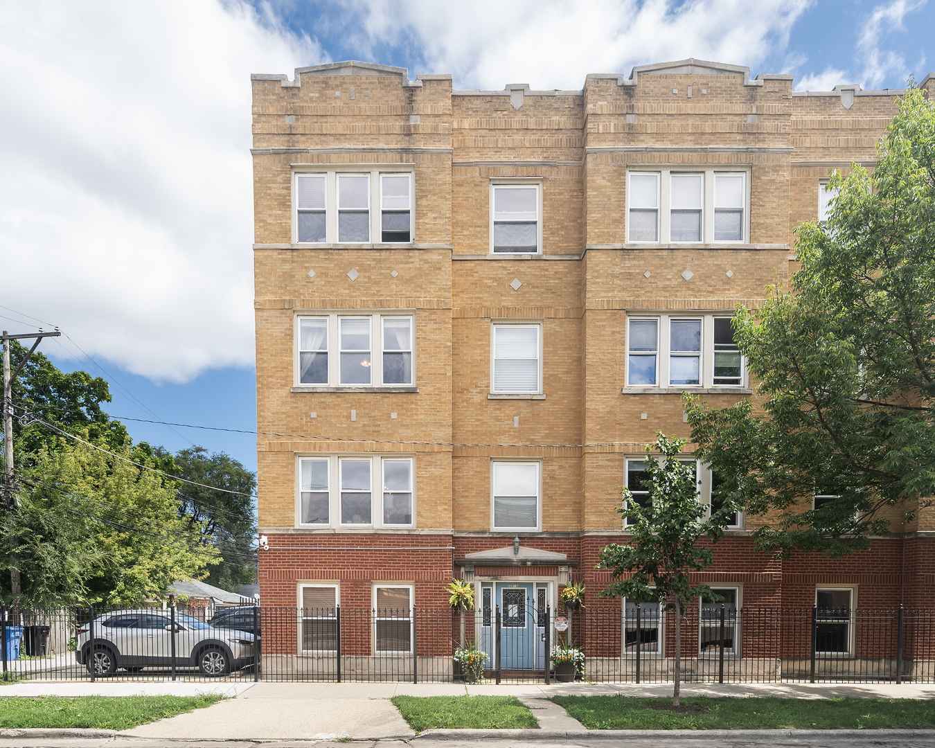 Step into charm and sunshine in this bright, corner 2 bed, 1 bath condo nestled in a classic brick building in Logan Square. This cheerful home blends vintage vibes with modern touches-gleaming hardwood floors, a spacious kitchen with sleek stainless steel appliances, and the everyday magic of in-unit laundry. Stay comfy year-round with central air and furnace heat, and enjoy the convenience of your very own exterior parking space. Out back, a cozy porch just off the kitchen is perfect for morning coffee or evening grilling sessions. Right across from the building is a lovely community park and designated dog area, which is convenient for this pet friendly building.  All this just moments from the vibrant buzz and endless delights of Logan Square!