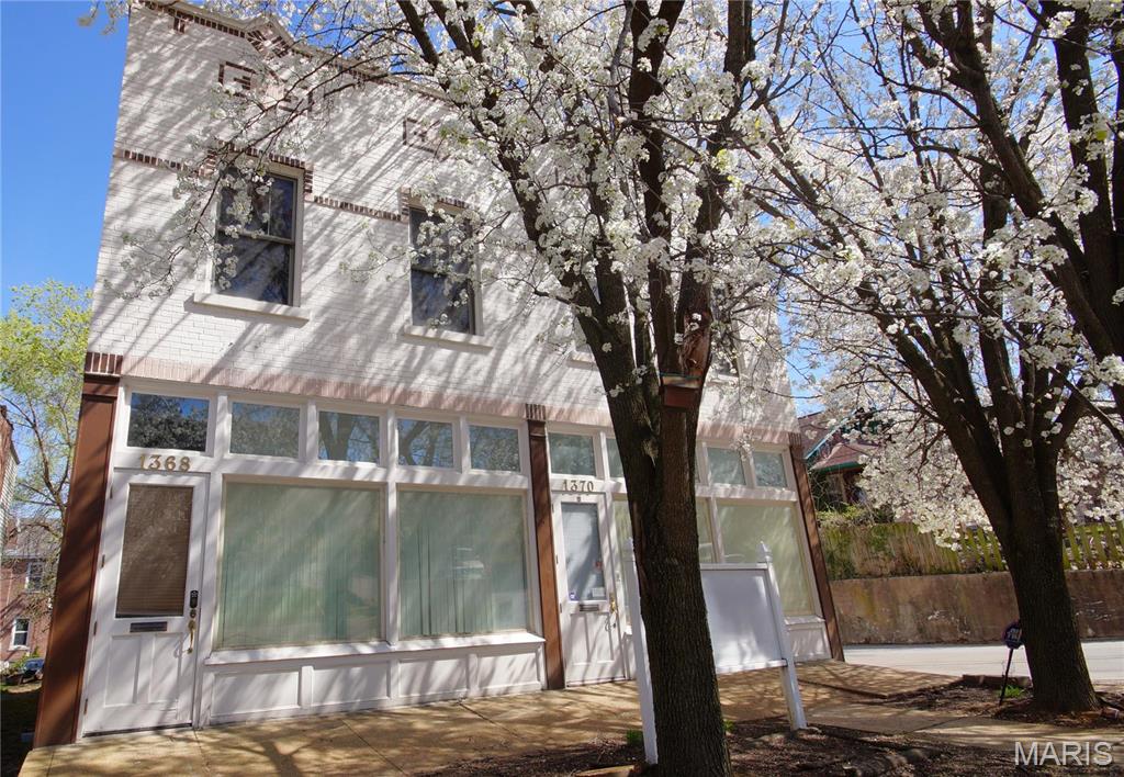 This highly visible mixed-use building in Dogtown offers a rare opportunity just a short walk from Forest Park. Conveniently located near Wash U, The Loop, and Downtown Clayton, with easy access to Highway 40/Interstate 64. Built in 1915 and meticulously maintained, this 3,240-square-foot brick building spans two floors. The first floor is a commercial space currently leased as an office, with the tenant vacating in April 2025. The second floor is a spacious three-bedroom, two-bath residence with a variance allowing for commercial use, also occupied by the current tenant. The basement provides additional workspace opportunity. There are several potential options for commercial and residential uses, and ideal for a live/work space. A fenced parking lot at the rear of the building provides eight parking spaces. The estimated pro forma rent for the commercial space is $2,265 per month, calculated at $16.78 sf, market rent for the apartment is $2,200. Location: Corner Location