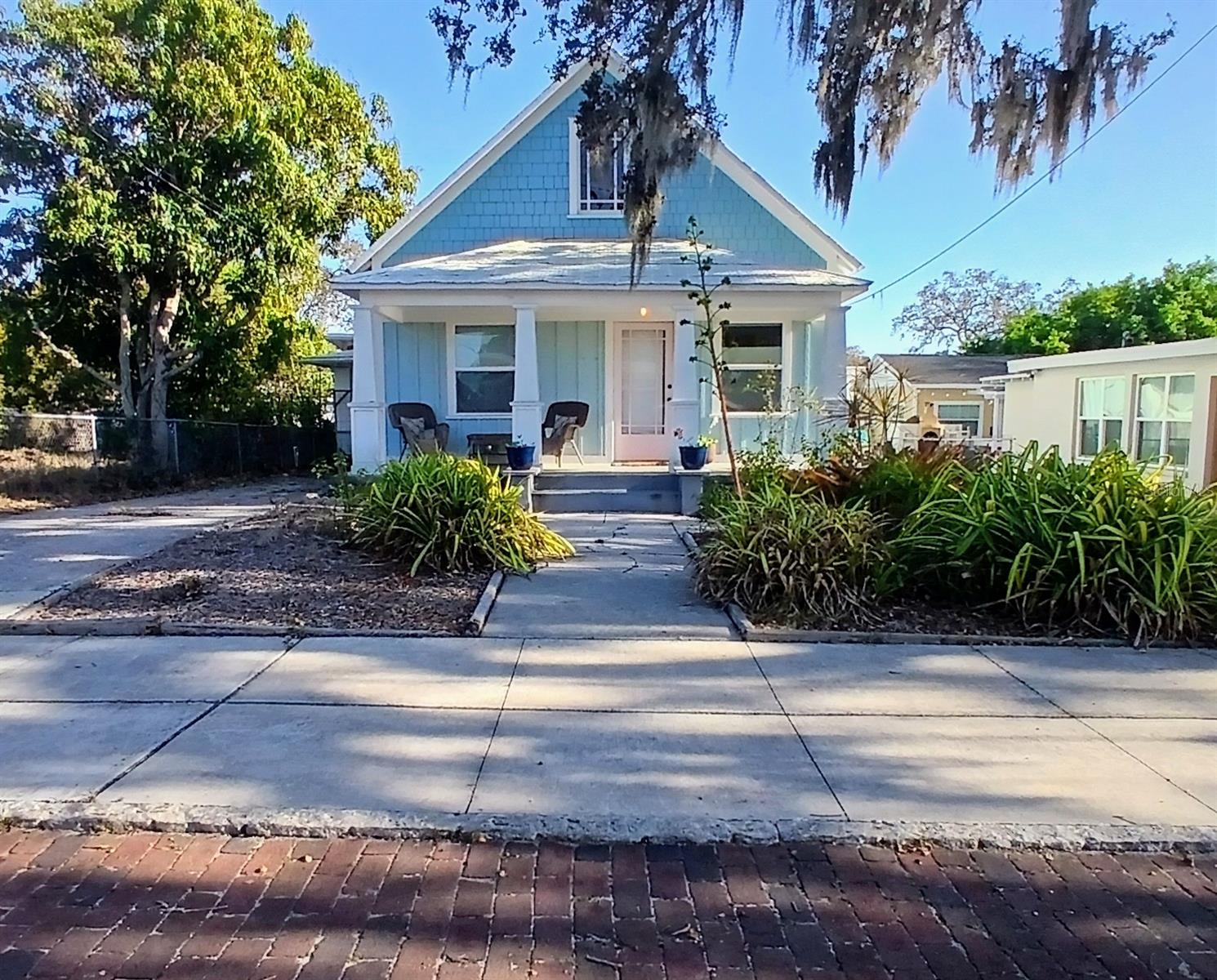 Located on a quiet brick street in the heart of Tarpon Springs, this well-maintained duplex offers excellent flexibility for homeowners and investors alike. Whether you're seeking a rental property or a home with the opportunity for additional income, this property delivers. Each unit features two bedrooms and one bathroom, along with its own private laundry and off-street parking. The main unit’s kitchen includes butcher block countertops and a farmhouse-style sink, while the updated bathroom showcases a walk-in shower with modern tile and fixtures. Luxury vinyl plank (LVP) flooring runs throughout the home, and the interior has been recently painted, creating a clean, bright feel. The second unit provides great versatility—perfect as an in-law suite, guest house, short-term rental, or long-term tenant space. This home is located outside of a flood zone and is within walking distance of many of the area’s most popular attractions, including the Tarpon Springs Sponge Docks, Spring Bayou, charming downtown Tarpon Springs, and the Pinellas Trail. Schedule your showing today and explore the possibilities this unique property has to offer.