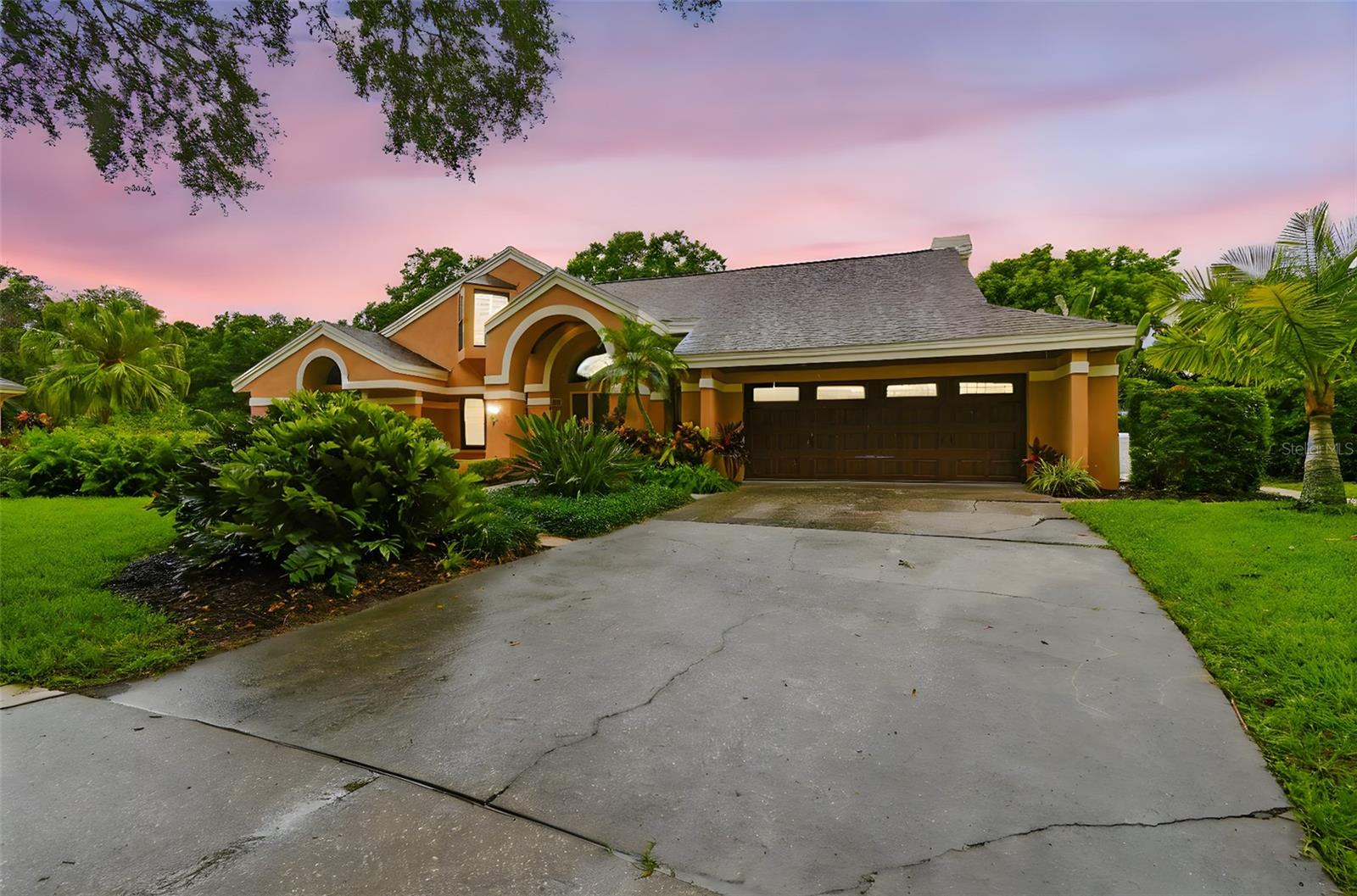 One or more photo(s) has been virtually staged. ***MASSIVE SAVINGS! $145,000 OFF ASKING PRICE*** Welcome to your dream home in the prestigious and highly sought-after community of Cobb’s Landing. This stunning 3-bedroom, 3.5-bathroom, pool home offers 3,031 square feet of thoughtfully designed living space, combining timeless elegance with modern comfort. Set along a picturesque, tree-lined street with incredible curb appeal, this residence perfectly captures the essence of Florida living.

Step through the grand entryway into a spacious and open layout highlighted by soaring ceilings, graceful archways, and elegant Patara travertine floors. The expansive living room features cathedral ceilings and built-in cabinetry, with direct access to the screened lanai and sparkling pool area. Ideal for entertaining, the gourmet kitchen boasts stainless steel appliances, a built-in oven and microwave, granite countertops, an oversized breakfast bar that seats six, and abundant cabinetry illuminated by recessed and pendant lighting. Flowing seamlessly from the kitchen is a bright dining area and a warm, inviting family room complete with a cozy fireplace and access to the private backyard oasis.

Outside, enjoy your own tropical retreat with a screened lanai, a sparkling pool and spa, lush landscaping, and a built-in outdoor kitchen—perfect for relaxing or hosting guests in style.

The home’s desirable split floor plan offers ultimate privacy, with the spacious primary suite located on the first floor. This luxurious retreat features direct access to the pool, a spa-inspired en suite bathroom with dual vanities, a heated/ jetted tub, a walk-in shower, a private water closet, and a large walk-in closet with custom built-in shelving. Upstairs, two additional bedrooms offer generous space for family or guests.
The den serves as an additional space for a home office/gym, a 4TH BEDROOM...the possibilities are endless.


Additional features include a 2-car garage, central vacuum system, and ample storage throughout the home.

Living in Cobb’s Landing means access to an array of resort-style amenities including a private marina with boat slips and a ramp to Lake Tarpon, a waterfront park, gated basketball and tennis courts, a playground, scenic walking trails, and a soon-to-open fishing pier. Located near top-rated schools, golf courses, medical facilities, and just minutes from shopping and dining, this exceptional home offers the perfect blend of lifestyle and location.