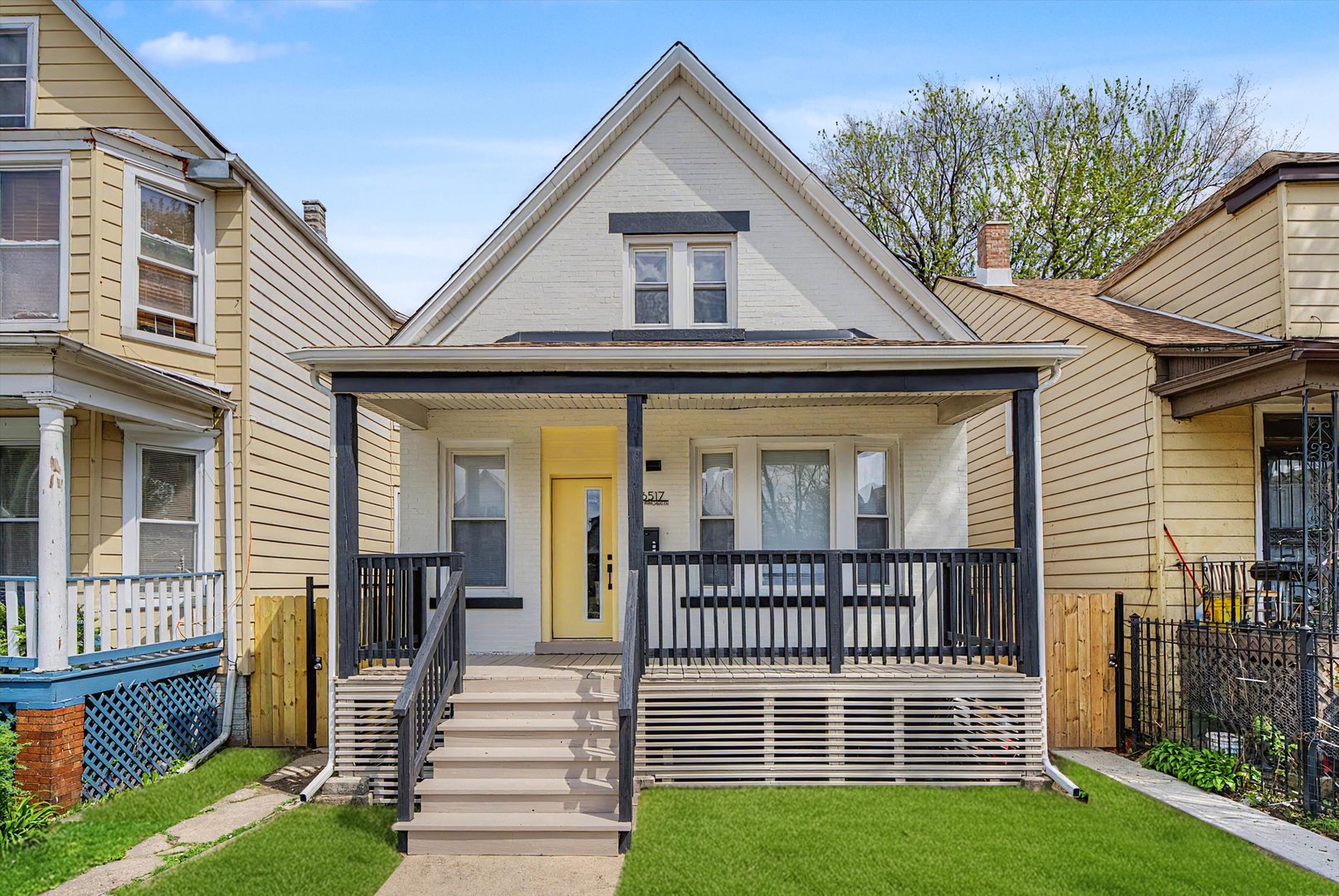 Discover 6517 S Winchester Ave, a beautifully updated 5-bedroom, 2-bathroom single-family home for sale in Chicago's West Englewood neighborhood. Thoughtfully renovated throughout, this move-in ready home offers modern finishes, flexible living space, and standout features that are hard to find at this price point. The main floor delivers an open, light-filled layout ideal for everyday living and effortless entertaining. New modern flooring flows throughout, giving the space a clean, cohesive feel. The updated kitchen is a true highlight, featuring quartz countertops, two-tone cabinetry, stainless steel appliances, and a built-in beverage station - a functional, on-trend upgrade that makes hosting guests simple and enjoyable.  The second level features 4 well-sized bedrooms that offer flexible space for sleeping, working from home, or creative pursuits. Both bathrooms have been refreshed with modern fixtures and quality finishes. The basement is partially finished with electrical already roughed in, making it significantly easier and more affordable to complete than a raw unfinished space. Whether you envision a home gym, rec room, home office, or additional living area, the hard work is already done. Step outside to a generous, private backyard perfect for summer entertaining or quiet evenings. A two-car parking pad with a sliding security gate provides the secure, off-street parking Chicago buyers prioritize. Whether you're a first-time buyer or moving up, 6517 S Winchester Ave delivers the space, style, and character that makes West Englewood one of Chicago's most compelling neighborhoods to buy into right now. Schedule your private showing today.