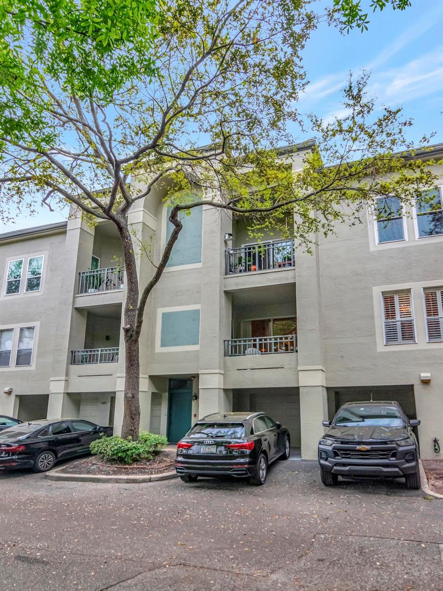 Beautifully updated 3-bedroom, 2-bath condominium located in the highly sought-after Island Place on Harbour Island. This well-appointed residence features thoughtful upgrades and a functional layout designed for comfortable everyday living.  The main living areas showcase hardwood flooring on the stairs, living room, and in the primary suite, while porcelain tile enhances the kitchen and dining area. The updated kitchen is both stylish and practical, featuring stainless steel appliances, marble countertops, a single oversized deep sink, custom tile backsplash, pendant lighting, and a peninsula with tiled knee wall. A built-in pantry with pull-out shelving provides exceptional storage and convenience.  A dedicated office nook with built-in shelving and cabinetry offers the perfect work-from-home or study space.The primary suite is privately positioned in a split-bedroom layout and features a custom walk-in closet and a beautifully appointed en-suite bath with a raised marble vanity and undermount sink, along with a deep soaking tub/shower combination with two niches and tile extending to the ceiling. The secondary bedrooms are generously sized, each with custom walk-in closets, and the second bath includes a raised vanity with granite countertop and undermount sink.  Additional highlights include designer light fixtures throughout, neutral interior paint color, and a 2-car garage with additional storage.  The unit is located just a short walk to the resort-style pool and fitness center.Island Place is a gated and guarded waterfront community offering an exceptional Harbour Island lifestyle. Perfectly positioned within walking distance to Water Street, Sparkman Wharf, Benchmark International Arena, and the Tampa Riverwalk, residents enjoy easy access to premier dining, shopping, and entertainment, as well as convenient connectivity to downtown Tampa, St. Petersburg, major interstates, and Tampa International Airport.