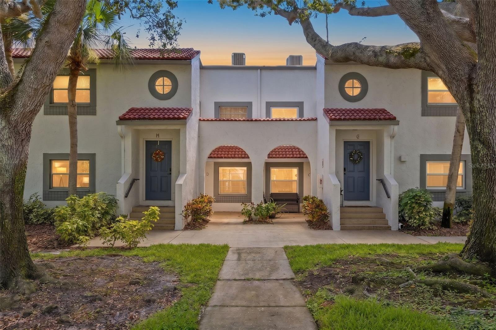 Located within the beautiful guard-gated community of Placido Bayou, this second-floor condo offers the perfect combination of comfort, privacy, and effortless living. With two bedrooms, two bathrooms, and soaring vaulted ceilings, the home feels bright, spacious, and inviting from the moment you step inside. New luxury vinyl flooring extends throughout the living area and bedrooms, creating a fresh, cohesive look that complements the home's open floor plan. The living and dining spaces flow seamlessly together, while large sliding glass doors lead to a screened balcony overlooking peaceful greenery, an ideal spot to enjoy your morning coffee, unwind after a long day, or simply take in the tranquil surroundings. The thoughtfully designed split floor plan provides privacy for both owners and guests. The spacious primary suite features an ensuite bath and generous closet space, while the second bedroom and full bath are positioned on the opposite side of the home, making it equally well suited for a family, visitors, or a home office. Life in Placido Bayou is about more than just the home itself. Residents enjoy a community pool and spa, beautifully landscaped grounds, scenic walking paths, picturesque lakes, and the peace of mind that comes with a 24-hour guard-gated entrance. Nature surrounds you, yet you're only minutes from vibrant downtown St. Petersburg, where waterfront parks, acclaimed restaurants, boutique shopping, museums, sporting events, and entertainment await. Gulf beaches, Tampa International Airport, and area golf courses are all within easy reach, while the Racquet Club of St. Petersburg, offering tennis and pickleball, is conveniently located just outside the neighborhood entrance. Whether you're looking for a full-time residence or a low-maintenance Florida retreat, this move-in-ready home offers the ideal opportunity to enjoy one of St. Petersburg's most sought-after gated communities.