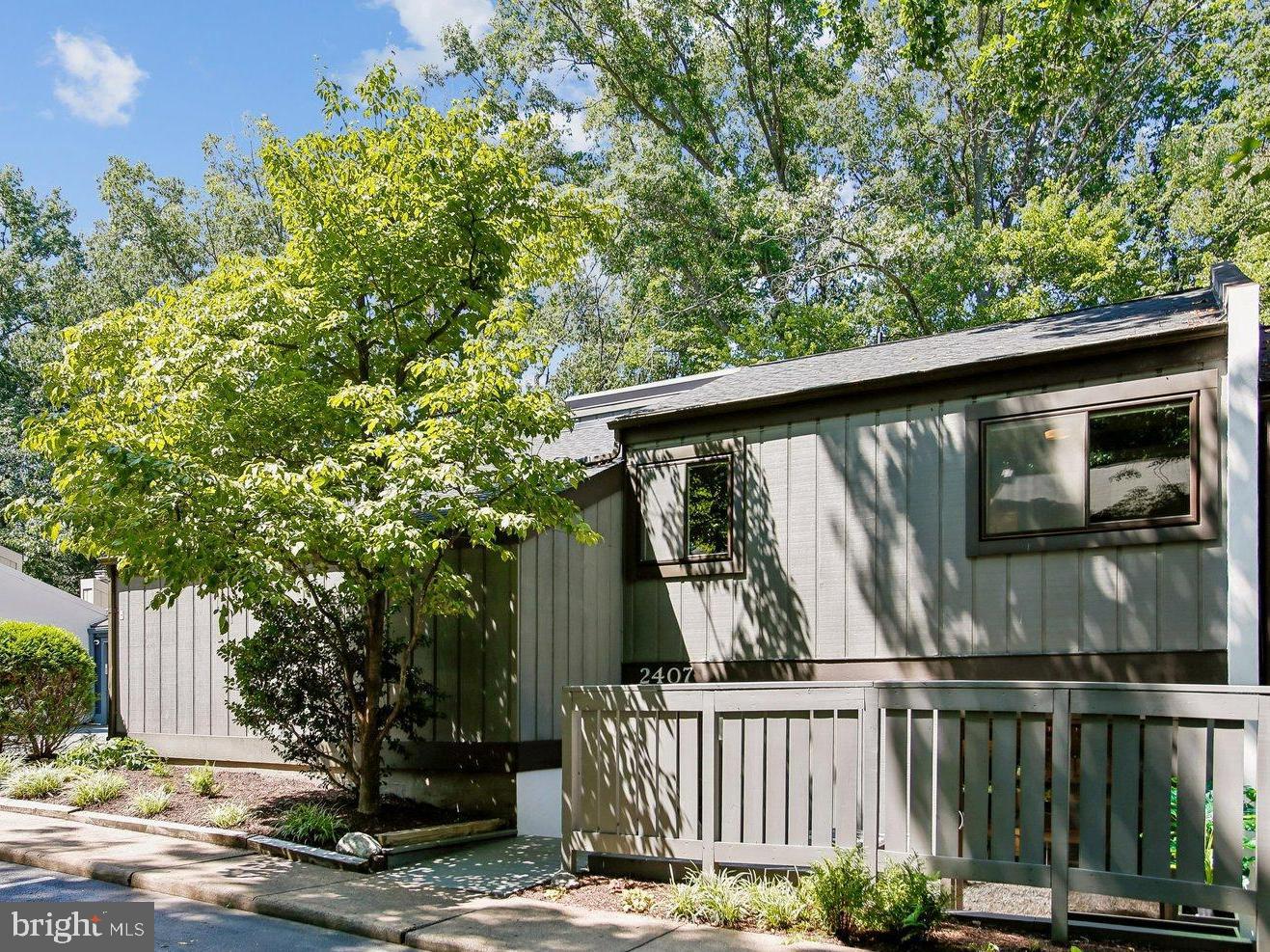 Classic Reston Contemporary Townhome Lives Like a Detached Home.   Almost 2000 Updated Square feet on two levels, Great Floorplan with Spacious Casual and Formal Living, Dining and Work/Study Spaces on the Main Level, Large Windows Positioned just right for Privacy and Views of the trees, Skylights to let in the Light, a cozy Conversation Pit for relaxing by the Fireplace and THREE outdoor spaces including a Large, Private Rear Deck, Walk-out Deck off the Living Room and Front Patio perfect for Morning Coffee, Container Gardening and more. Upper-Level Primary Bedroom with En-Suite Bath, Two additional Upper-Level Bedrooms and additional Full Bath.  Convenient Garage Level Mudroom.   Two Car Side-Load Attached Garage.   New HVAC 2025, New roof 2022, New Range and Refrigerator 2025, New Washer/Dryer 2024.   Easy access to Reston Parkway, Shopping and Reston Pools, Paths and Amenities.