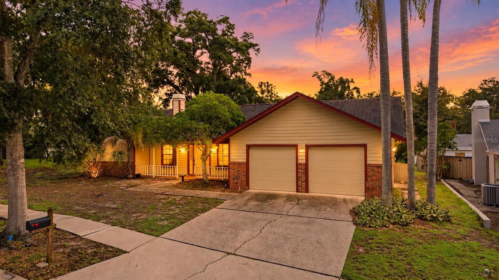 Welcome to Lake Valencia! This beautiful Palm Harbor pool home has the space, layout, curb appeal, and location you've been waiting for all for under $500,000! Step through the front door and you're greeted by a spacious living room with an incredible view straight through to the pool and backyard. A beautiful fireplace creates a warm focal point for the living space, while the open sightline to the pool gives the home that unmistakable Florida feel. Just to the left, the private primary suite is thoughtfully separated from the remaining bedrooms, creating the privacy buyers' love in a split-bedroom floor plan. Continue into the kitchen and you'll find plenty of room to cook, entertain, and gather. The center island provides the perfect gathering spot, with additional space for barstools and plenty of room for friends and family to stay connected while meals are being prepared. A dedicated formal dining area offers another inviting space to sit down, celebrate, and make memories. Follow the home into the opposite bedroom wing and you'll find three additional bedrooms, offering flexibility for family, guests, a home office, or whatever your lifestyle requires. One of the bedrooms is currently being used as a second living room/TV room and office showcasing just how versatile this floor plan can be. Step outside and the backyard truly becomes an extension of the home. The beautiful pool is the centerpiece of a private outdoor setting designed for Florida living, whether you're hosting friends, relaxing poolside, or enjoying a quiet evening at home. The pool bathroom provides convenient access from the backyard, making pool days even easier. A two-car garage adds everyday convenience and storage, while the newer roof and newer A/C provide important peace of mind. The home retains its original character while being exceptionally well maintained and ready for its next owner to move in, enjoy, and personalize over time. And then there's the location. Palm Harbor is the lifestyle buyers move to Florida for!  Established neighborhoods, excellent amenities, dining, shopping, recreation, and easy access to everything the Tampa Bay area has to offer. You're close enough to enjoy the Gulf, beaches, parks, and everything Pinellas County has become known for, while still enjoying the comfort of a true residential neighborhood. Four bedrooms. Two bathrooms. Private pool. Split floor plan. Fireplace. Two-car garage. Newer roof. Newer A/C. Incredible outdoor living. Prime Palm Harbor location. Homes offering this combination of space, condition, pool, and location don't stay overlooked for long. Come see 4926 Parson Brown Lane and imagine what life could look like here.