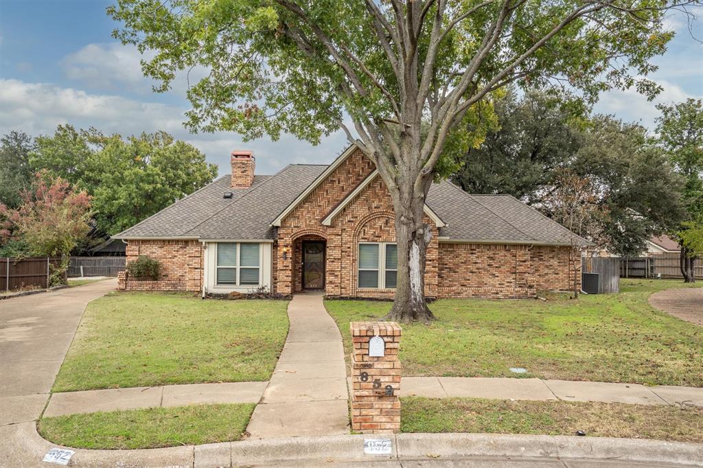 Experience the perfect blend of comfort, space, and timeless character in this beautifully maintained 4-bed, 2.5-bath home, offering three generous living areas and a refreshing backyard pool—ideal for entertaining or unwinding. Situated on an expansive nearly half-acre property with mature trees, this home provides privacy and a serene, park-like setting. Step inside to discover rich craftsmanship and inviting warmth throughout. The home features dramatic wood-paneled walls, a striking floor-to-ceiling brick fireplace, vaulted ceilings, and a skylight that fills the space with natural light. The rooms flow seamlessly into additional living and dining areas, offering flexibility for gatherings, hobbies, or quiet retreat. The kitchen showcases granite countertops, custom wood cabinetry, and a distinctive brick cooking alcove that adds charm and character. Just off the main spaces, you’ll find a built-in wet bar with pass-through openings, perfect for hosting and enhancing the home’s natural flow.With 2,834 square feet, this residence offers spacious bedrooms, multiple dining areas, and thoughtfully crafted details throughout. Conveniently located near a variety of local amenities, dining options, and everyday essentials, this home provides a wonderful balance of comfort, character, and convenience. Ready to welcome its next owners, this one-of-a-kind property truly stands out from the rest.