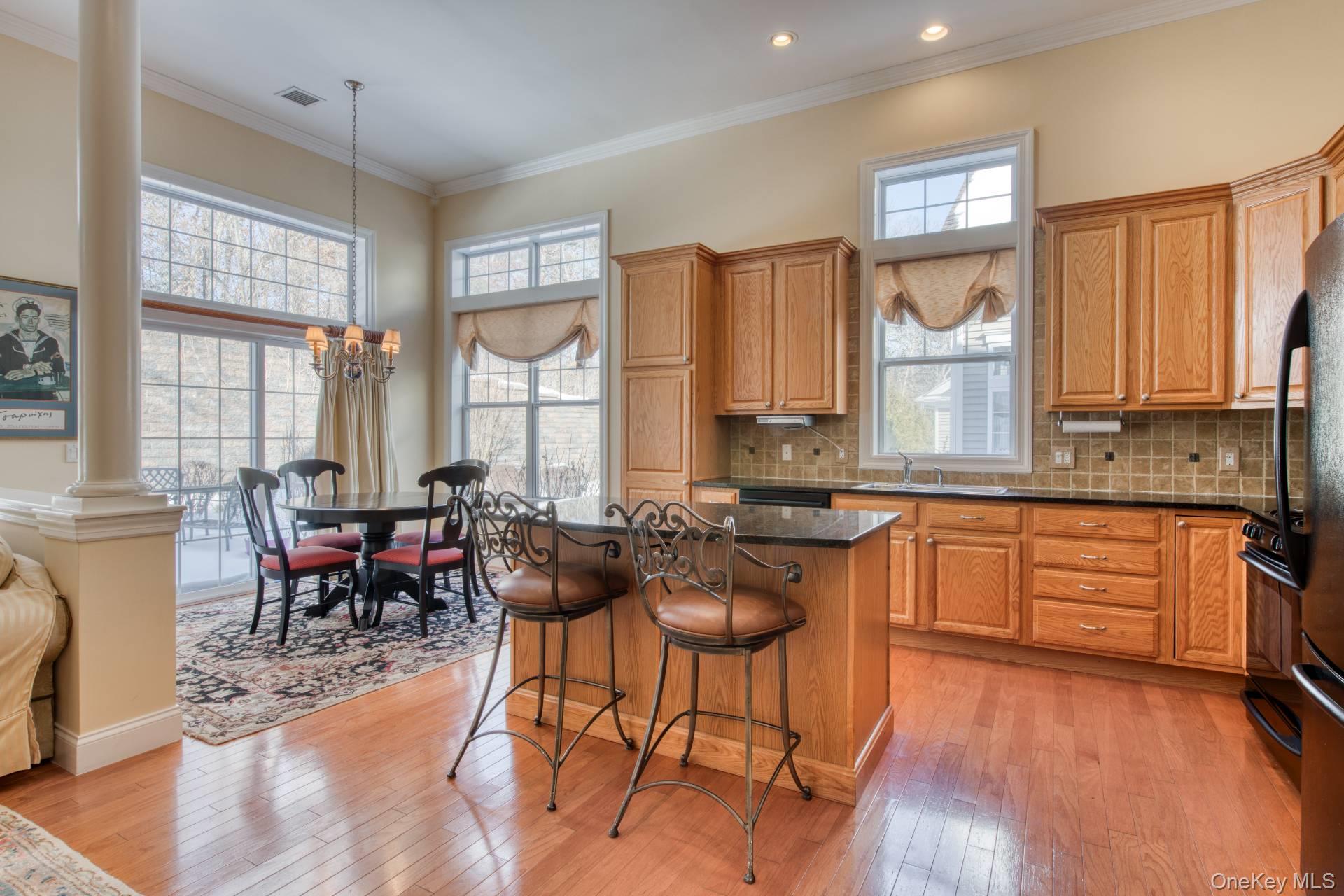 Encore Atlantic Shores Gated 55+ CommunityFirst time on the market - Expanded Tempo in Encore Atlantic Shores, a premier 55+ gated community offering an active lifestyle with an array of exceptional amenities. The first floor houses the primary ensuite bedroom with walk-in closet and a guest bedroom and bath along with a formal dining room, living room and open kitchen with a casual eating area. Upstairs is a generous loft space and a large storage area. Fireplace and 2 car attached garage. The community amenities are second to none, featuring a clubhouse with living room, gym, library, card room, billiards room, ballroom and an indoor pool and spa with men's and women's locker rooms. Outdoor enthusiasts will enjoy the walking paths, tennis, pickleball, shuffleboard, bocce, putting green and a large pool and spa with plenty of seating and lounging options. Enjoy this unique opportunity for luxurious living in a vibrant community.