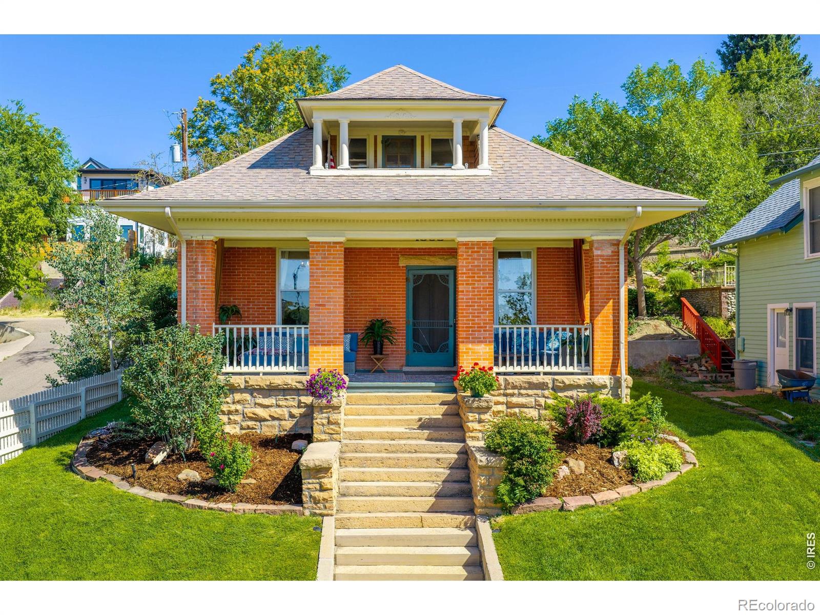 Some homes have a great location. Others have incredible views. It's exceptionally rare to find both.Set on one of the most desirable blocks in Mapleton Hill, just steps from the Pearl Street Mall, this beautifully restored American Craftsman enjoys what are arguably some of the best Flatiron views in all of Boulder. Whether you're relaxing on one of the two south-facing porches or simply looking out the large windows, the backdrop is nothing short of spectacular, with effortless Flatiron views from almost every room. Inside, the home blends historic charm with thoughtful modern updates. Original woodwork and timeless architectural details have been carefully preserved, while the updated kitchen and numerous improvements make it as comfortable as it is beautiful. Natural light fills the home, highlighting the warmth and character that only a true historic property can offer.The landscaped yard provides a peaceful outdoor retreat, and the large unfinished basement offers endless possibilities for additional living space, a workshop, wine cellar, home gym, or extra storage.This is a home that lets you experience the very best of Boulder every day. Walk to Pearl Street's restaurants, cafes, shops, and farmers market, then come home to views that never get old. Opportunities like this are incredibly rare-a classic Boulder home in an unbeatable location with views that are simply in a class of their own.