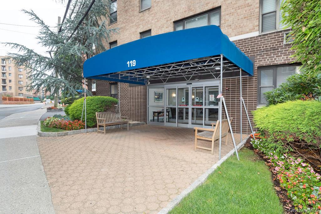 Commuter's dream! Welcome to the Fenimore House, a pet friendly complex in the heart of Hartsdale!  This top-floor corner unit  features a spacious living room, dining area, modern kitchen- (new stainless steel  refrigerator, microwave) and renovated bathroom.  There is hardwood flooring underneath the carpeting. Gas, heat, and hot water are included in the monthly maintenance. The building offers common laundry on every floor and an assigned outdoor parking space transfers with this unit. ($46.04 plus $2.96 parking assessment) One pet permitted -1 Dog or 2 cats.  Dogs okay with weight restriction up to 25 lbs.  restaurants, pharmacy, wine and liquor store, bakery, and much more.  Conveniently located within five minutes to Hartsdale Village -Metro North Railroad (easy commute to NYC for work or play), easy access to major highways, shopping, pharmacy, coffee shops, and a variety of restaurants and daily necessities, this complex offers both comfort, peace and accessibility. In addition, there is an Express Bus to NYC nearby on Central Avenue. There is a live in superintendent.  Residents are also eligible to join the beautiful Greenburgh Town pool and park. Don't miss the opportunity to own this exceptional co-op in a prime location. Laundry on every floor.  All utilities are included in the monthly maintenance.