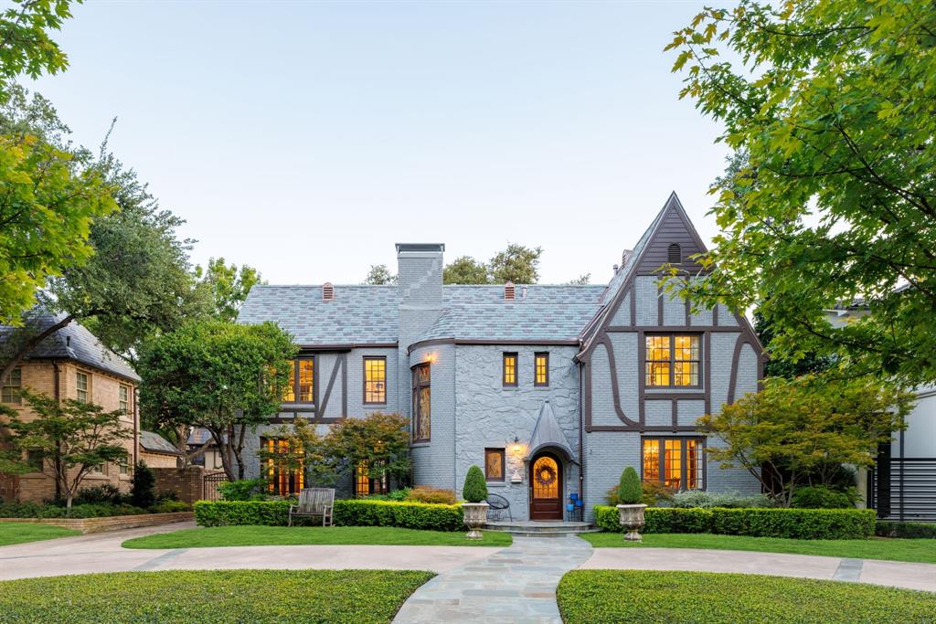 Set on one of the most coveted streets in Highland Park, this timeless 1928 Tudor residence offers a rare blend of preserved architectural character and refined modern living. With 3,876 square feet, 4 bedrooms, 3 full bathrooms, and one half bathroom, the home captures both elegance and comfort in every detail.Inside, the historic charm is immediately apparent. Original stained-glass windows, detailed crown molding, and thoughtful craftsmanship reflect the artistry of a bygone era, while a new slate roof and copper gutters provide enduring strength and beauty. The interiors balance warmth and sophistication, with inviting living and dining spaces designed for both intimate gatherings and grand entertaining. A dedicated home office provides a private retreat for today’s lifestyle, while the primary suite serves as a serene escape, complete with a beautifully finished walk-in closet.The outdoor spaces are equally captivating. A lush backyard features a covered patio and custom putting green, creating the perfect setting for relaxation, recreation, and entertaining beneath the shade of mature trees. Complementing the main residence, a detached two-car garage with private living quarters above offers flexibility for guests, extended family, or staff.Positioned in the heart of Highland Park, this extraordinary property combines enduring character with modern amenities in one of Dallas’ most prestigious locations. From its historic Tudor architecture to its resort-inspired outdoor living, 4309 Beverly Drive represents a rare opportunity to own one of Dallas’ most distinguished homes