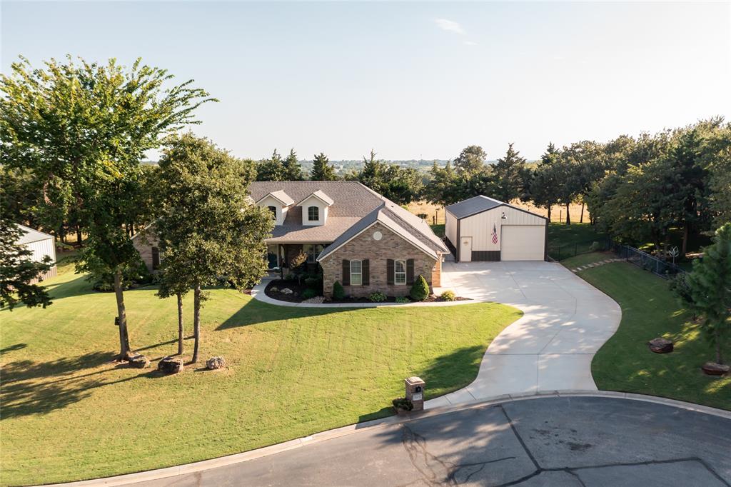 Elegant, Private Retreat on a Wooded 0.84-Acre Lot with Workshop.
Experience the perfect balance of elegance, comfort, and privacy in this immaculate 3-bedroom, 2.5-bathroom, office/flex room home, nestled on a beautifully wooded 0.84-acre lot in a prestigious, tree-lined community. Thoughtfully maintained and freshly updated with new interior paint and refined finishes, this home offers both sophistication and serenity.
The spacious living area welcomes you with a stunning stone fireplace, perfect for cozy evenings or entertaining guests. A gourmet kitchen anchors the home featuring rich custom cabinetry, granite countertops, stainless steel appliances, a large walk-in pantry, and a sunny breakfast nook.
The formal dining room impresses with elegant shiplap detailing and a tray ceiling, ideal for hosting dinner parties or holiday gatherings.
The private primary suite is a true sanctuary, complete with a tray ceiling, spa-like ensuite with dual sinks and expansive counter space, and a generous walk-in closet with custom built-ins. A flexible bonus room connected to the primary bedroom makes the perfect nursery, office, or creative space. Step directly from your bedroom onto a private patio, perfect for morning coffee or quiet reflection.
Outside, the property transforms into your own personal retreat. Enjoy three extended patios, lush professional landscaping, a fully fenced yard with irrigation, and mature trees offering natural shade and privacy. An impressive 32-foot fire pit area under a canopy of trees invites star gazing and relaxed evenings with family and friends.
For hobbyists or those in need of extra storage, the 24x36 workshop with 220V power provides abundant space and versatility.
Located just minutes from the highway for easy access to shopping, dining, and commuting, this home is truly a rare find,offering modern comfort and timeless beauty in a peaceful, natural setting.