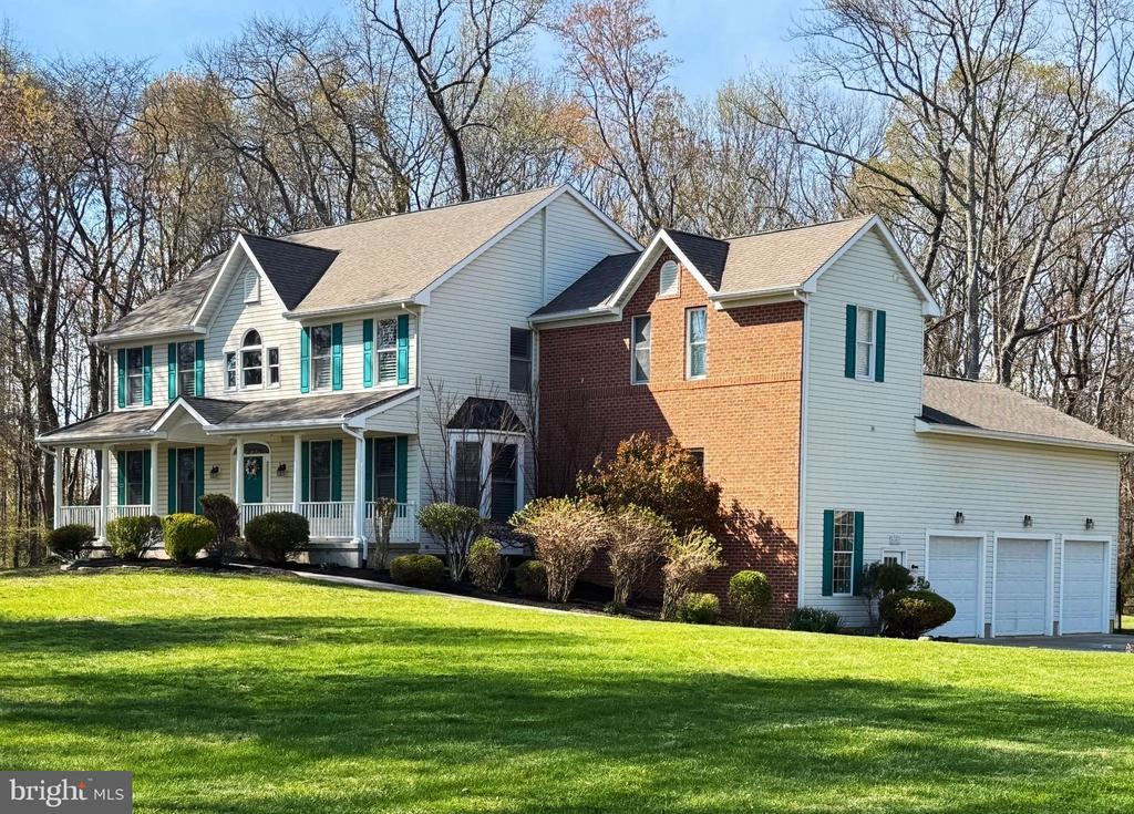 **Professional Photos Coming Soon** Welcome to this beautifully maintained upscale and thoughtfully upgraded home located on 4.82 private acres in one of Mount Laurel’s most desirable settings. Offering over 3,224 square feet of living space, this impressive 4-bedroom, 2 full and 2 half bath home features a fully finished walkout basement, in-ground heated pool, and a rare 3.5-car high-bay garage with a work shed, providing additional clearance for oversized vehicles, storage, or workshop use. From the moment you arrive, the home’s stately curb appeal, mature landscaping, and expansive property create an impressive first impression. Inside, a dramatic two-story foyer welcomes you with an elegant chandelier, rich hardwood flooring, and a grand dual staircase offering both a formal entry from the foyer and a convenient secondary staircase leading directly to the kitchen. To the right of the foyer, the formal dining room features beautiful bay windows with plantation shutters, filling the space with natural light and creating an elegant setting for gatherings and special occasions. To the left, a versatile front room offers the perfect space for a home office or study. Throughout the home, crown molding, tasteful custom woodwork, and plantation shutters add warmth and timeless character. Toward the rear of the home, the spacious living room offers a welcoming gathering space centered around a wood-burning fireplace, with large windows bringing in natural light and views of the surrounding property. The well-appointed kitchen is designed for both function and style, featuring marble countertops, abundant cabinetry, stainless steel appliances including double ovens, and a large center island ideal for everyday living and entertaining. Glass-front cabinetry and a built-in beverage area add charm and convenience. The adjoining breakfast room is surrounded by windows overlooking the peaceful backyard and provides access to the expansive deck, perfect for morning coffee or outdoor dining. Additional main-level highlights include a spacious laundry room with built-in storage and utility sink, a conveniently located half bath, walk-in pantry, and interior access to the oversized 3.5-car garage. The home is also equipped with a dual-zone HVAC system, providing efficient, customized comfort throughout multiple levels of the home, as well as a central vacuum system. Upstairs, the home offers four spacious bedrooms, all with double-large closets, and two full bathrooms, including an impressive primary suite designed as a true retreat with two large walk-in closets. The beautifully updated primary bathroom features dual vanities, a luxurious freestanding soaking tub, and a glass-enclosed shower with elegant tilework and modern finishes. A third expansive walk-in closet the size of a room is conveniently accessed through the bathroom and offers custom shelving, built-in storage, a ceiling fan, and attic access, offering exceptional organization and functionality. A second full bathroom serves the additional bedrooms and features a skylight that fills the space with natural light, along with an updated tiled shower and modern vanity, creating a bright and stylish space for family or guests. The fully finished walkout basement expands the home’s living space even further, offering a large recreation area ideal for movie nights, entertaining, or game days, already equipped with a custom-ready movie theater with a projector, wall screen, and speakers. Built-in cabinetry, counter space, and a beverage cooler create the perfect bar or serving area, while additional rooms provide flexible space for a home gym, office, or hobby room. The backyard in-ground heated pool creates a private retreat, offering the perfect setting for relaxing and entertaining, equipped with a newer pool pump as well. This exceptional property is also located in a highly regarded school district. Schedule today!