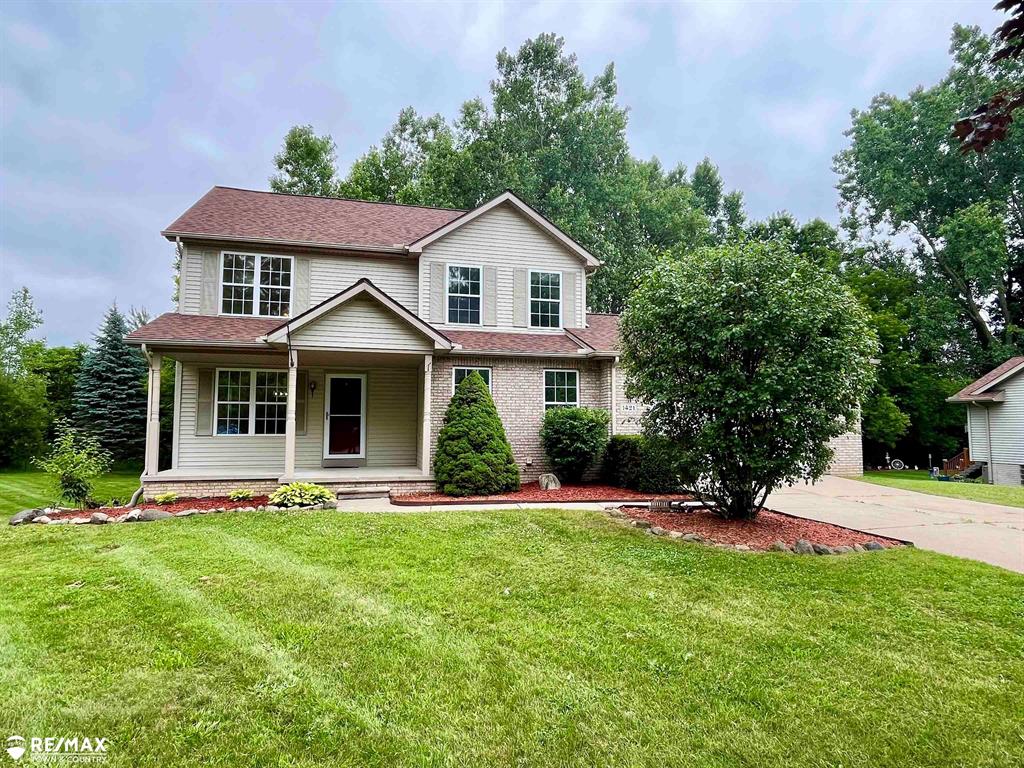 Welcome to this 4 bedroom home located in a nice cul-de-sac in award winning Davison School district.  Sitting on the new deck, you'll enjoy the peaceful and private backyard which is lined with mature trees, nothing behind you except nature.  Primary bedroom en-suite is conveniently located on the first floor along with the laundry room.  Washer & dryer are also included in the sale.  The majority of the interior has been freshly painted.  Living room offers a vaulted ceiling and great windows allowing plenty of natural lighting in. The kitchen offers plenty of cupboards and a door-wall leading out to the deck.  Brand new roof just a few years ago.  Basement has tall ceilings and is ready for your finishing touches to add extra living space and also has a large window. Close to everything Davison has to offer, call today for your private showing.